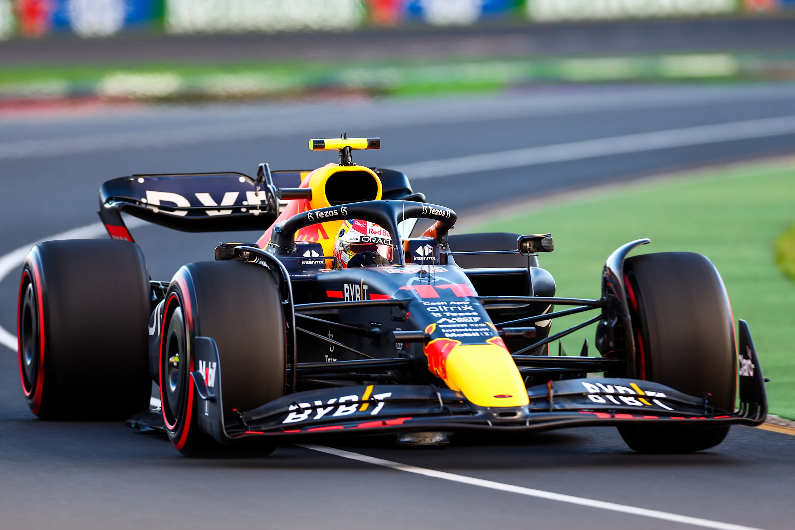 MELBOURNE, AUSTRALIA - APRIL 09: Sergio Perez of Mexico and Red Bull Racing during qualifying ahead