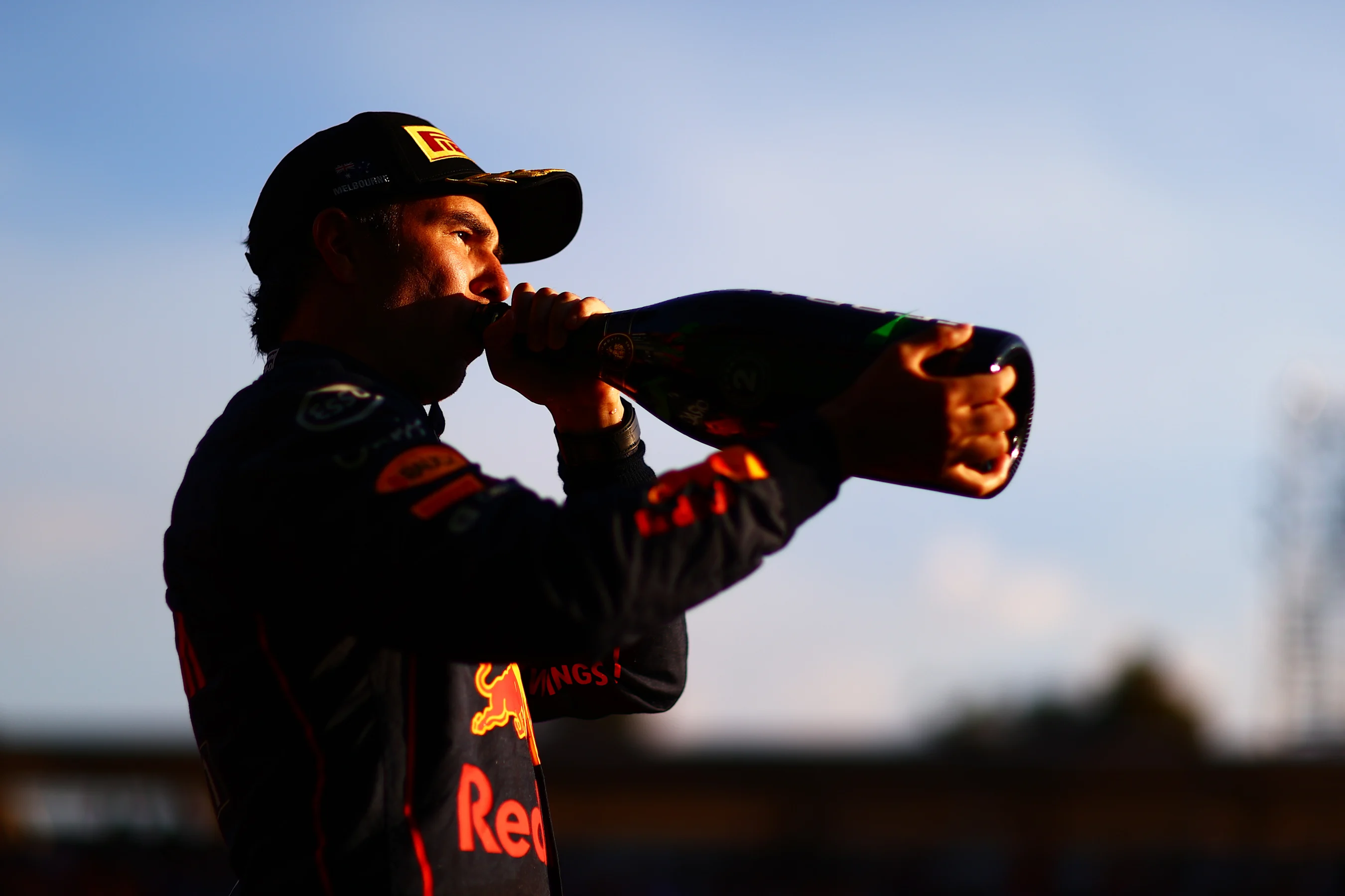 MELBOURNE, AUSTRALIA - APRIL 10: Second placed Sergio Perez of Mexico and Oracle Red Bull Racing