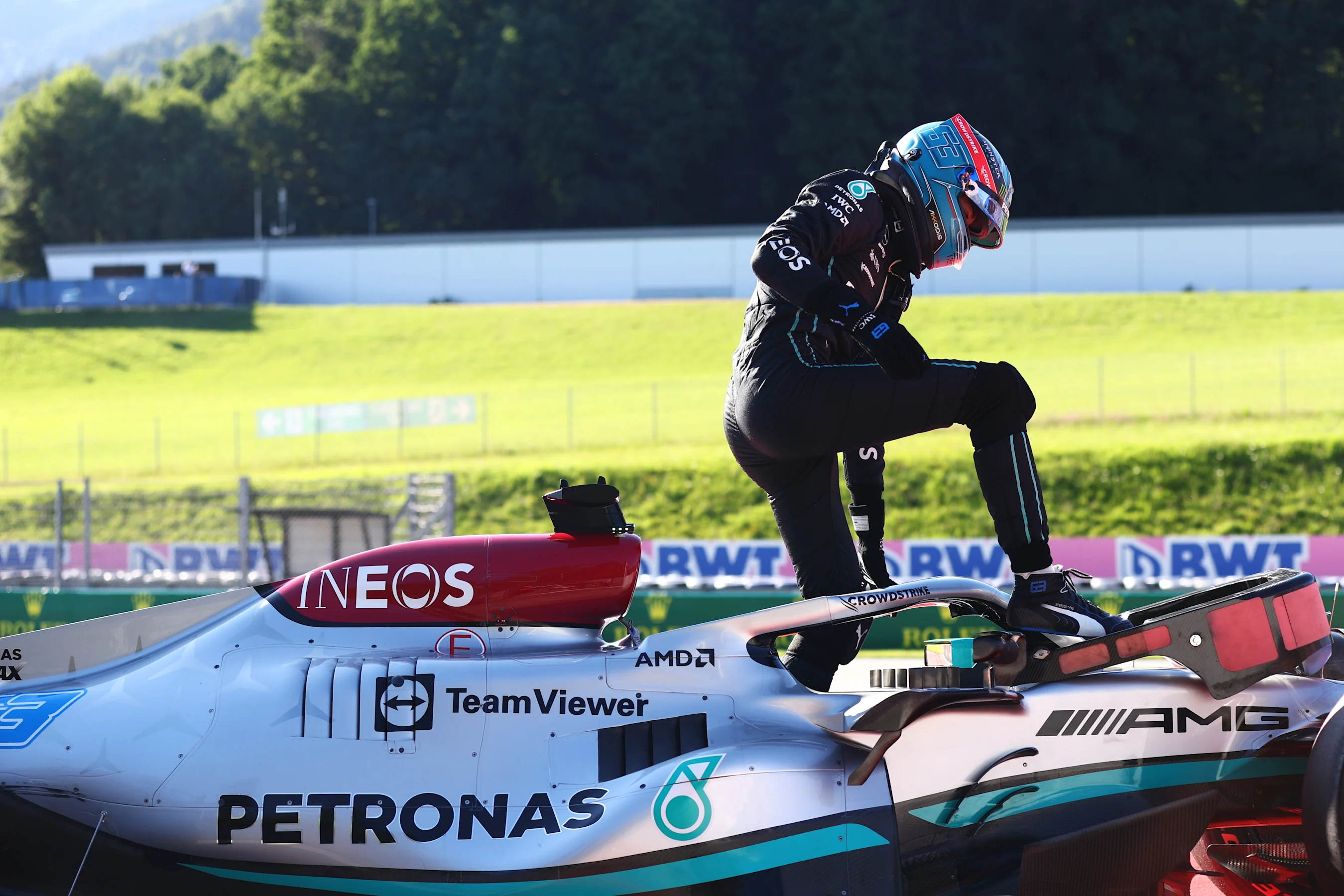 SPIELBERG, AUSTRIA - JULY 08: George Russell of Great Britain and Mercedes walks from his car after
