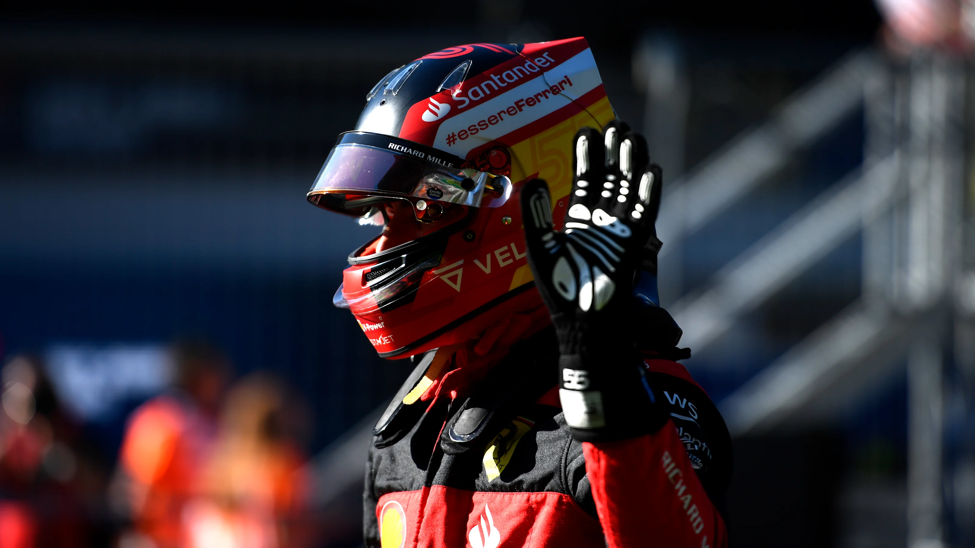 SPIELBERG, AUSTRIA - JULY 08: Third placed qualifier Carlos Sainz of Spain and Ferrari waves in