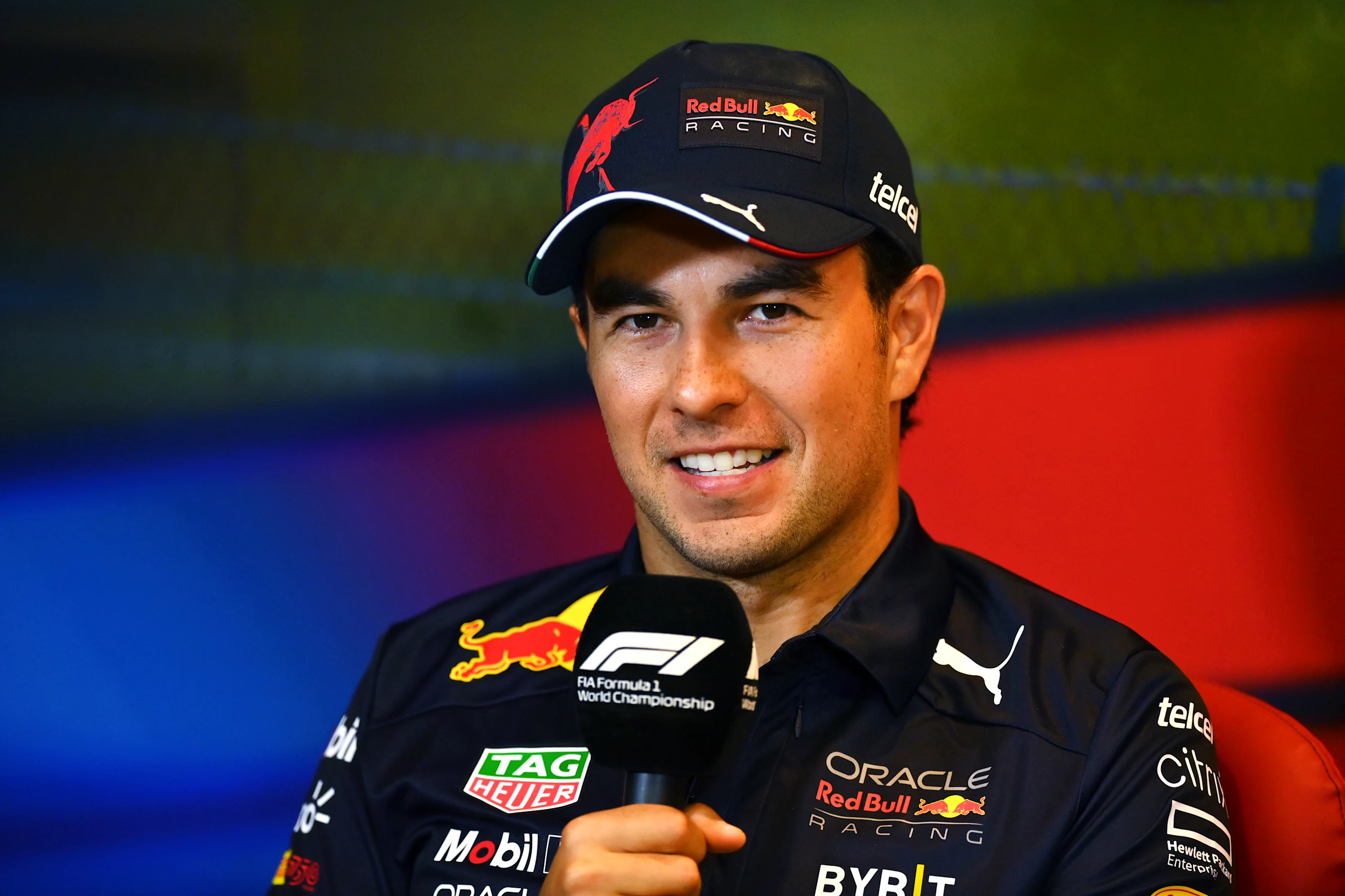 BAKU, AZERBAIJAN - JUNE 10: Sergio Perez of Mexico and Oracle Red Bull Racing talks in the Drivers