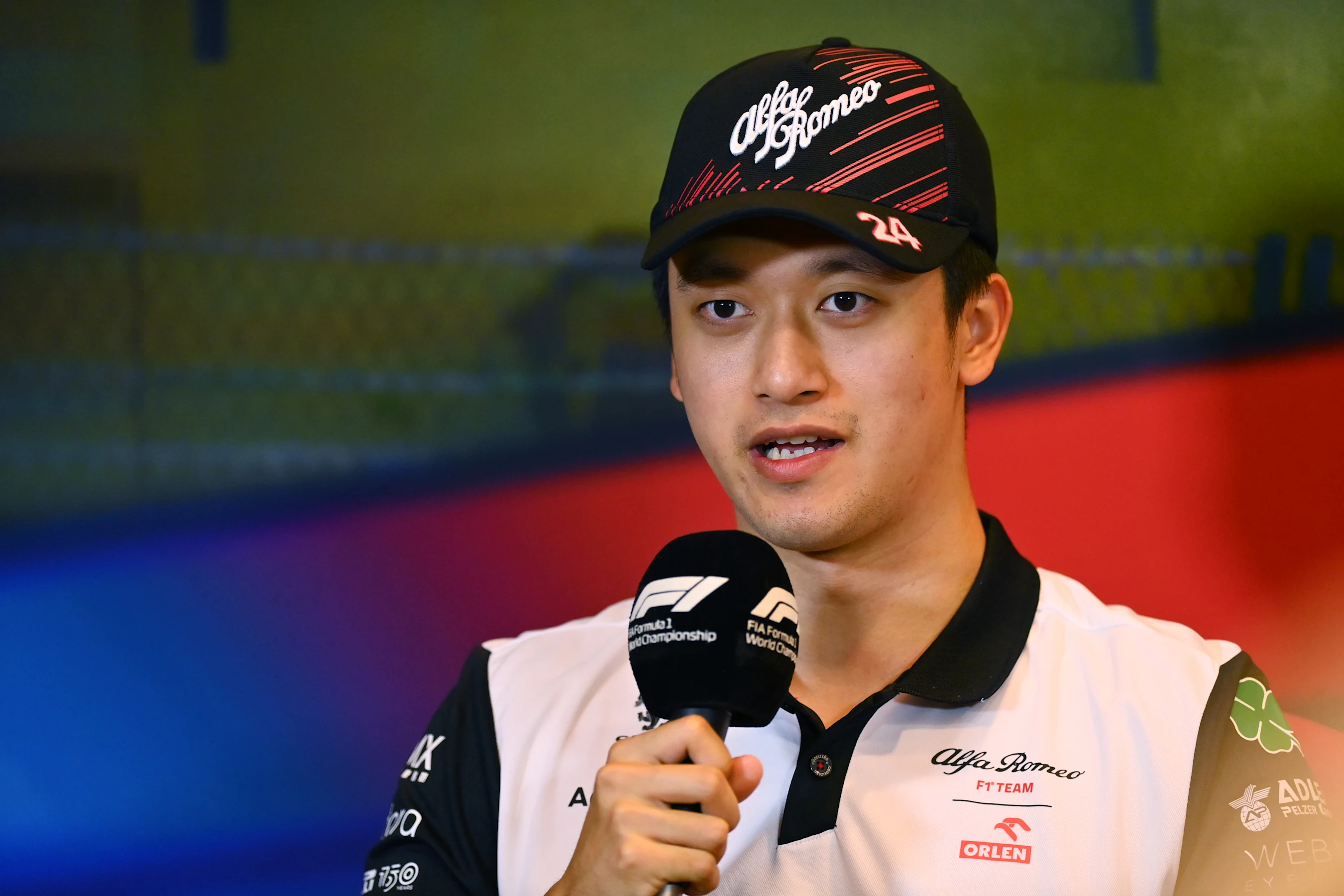 BAKU, AZERBAIJAN - JUNE 10: Zhou Guanyu of China and Alfa Romeo F1 talks in the Drivers Press