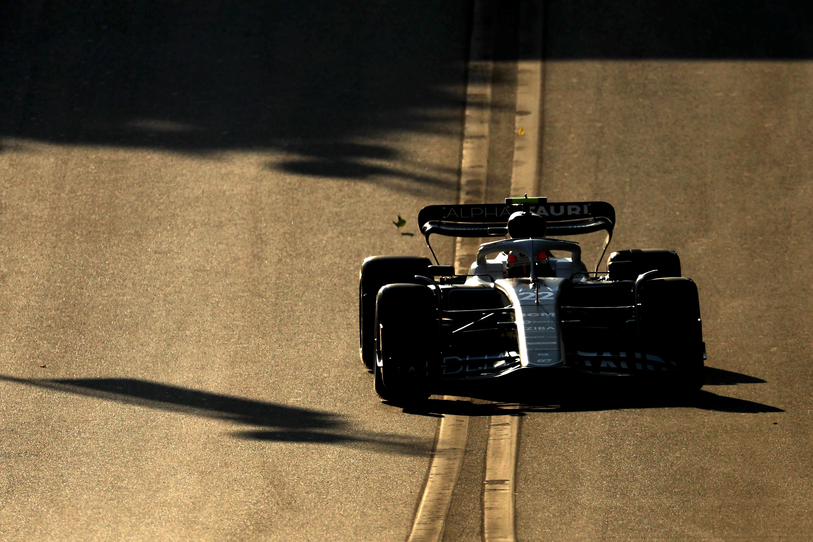 BAKU, AZERBAIJAN - JUNE 10: Yuki Tsunoda of Japan driving the (22) Scuderia AlphaTauri AT03 on