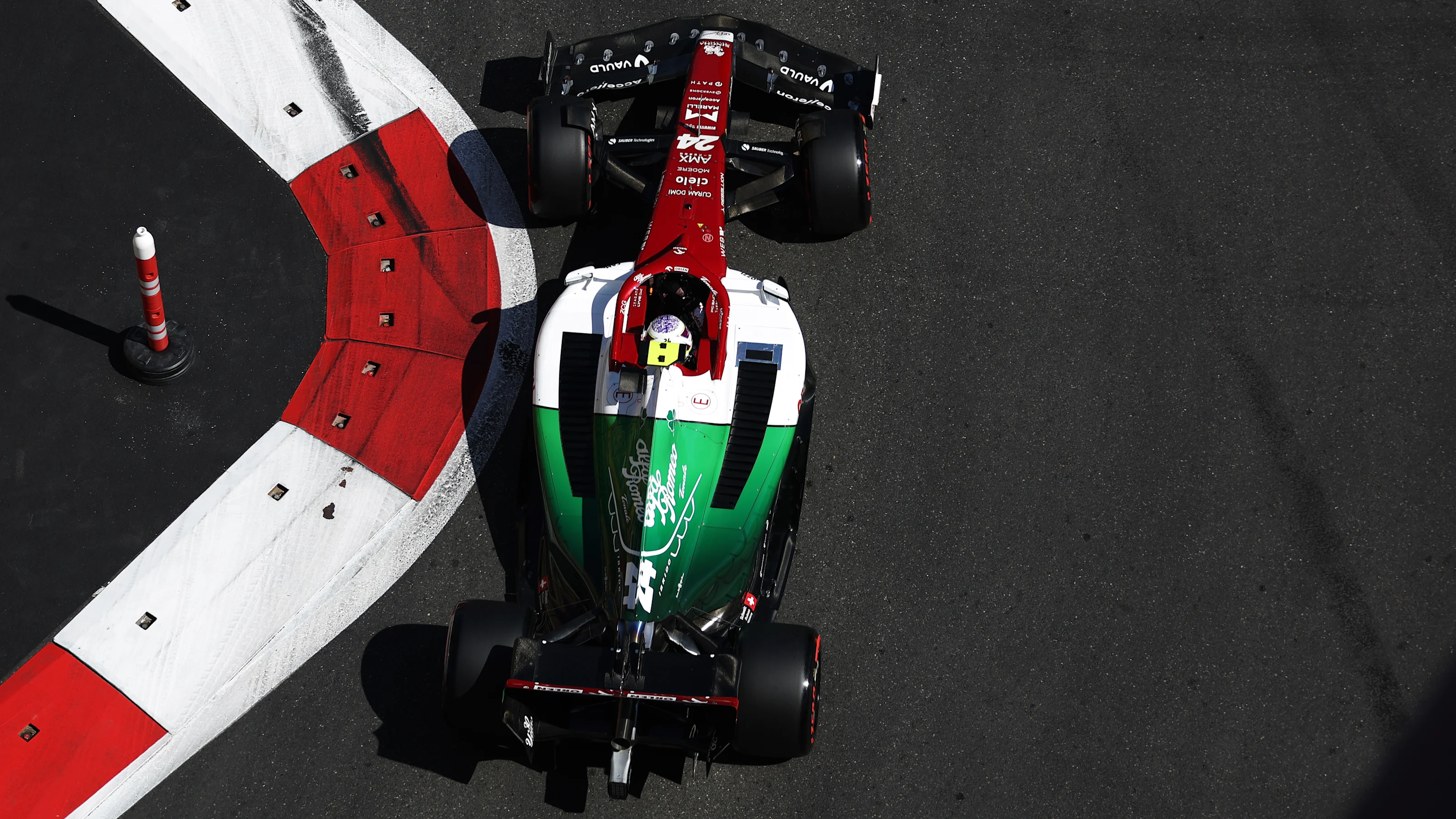 BAKU, AZERBAIJAN - JUNE 11: Zhou Guanyu of China driving the (24) Alfa Romeo F1 C42 Ferrari on