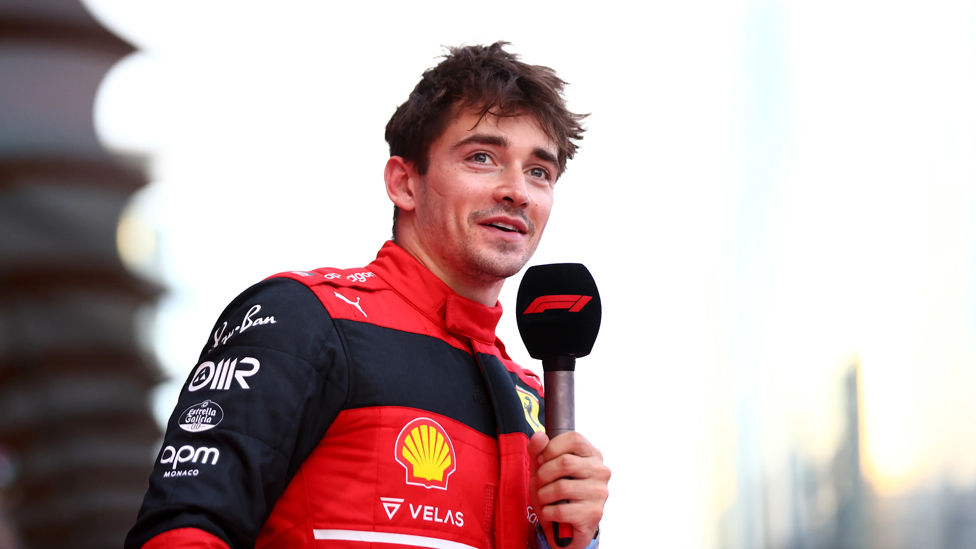 BAKU, AZERBAIJAN - JUNE 11: Pole position qualifier Charles Leclerc of Monaco and Ferrari talks to
