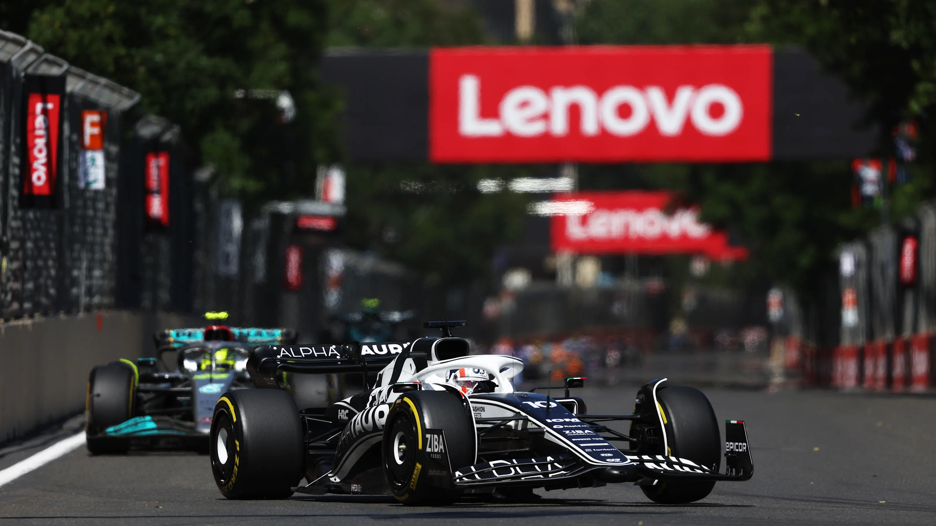 BAKU, AZERBAIJAN - JUNE 12: Pierre Gasly of France driving the (10) Scuderia AlphaTauri AT03 leads
