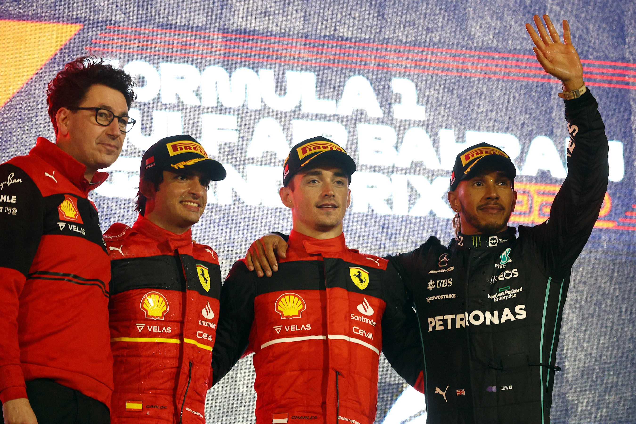 BAHRAIN, BAHRAIN - MARCH 20: Race winner Charles Leclerc of Monaco and Ferrari (second from right),