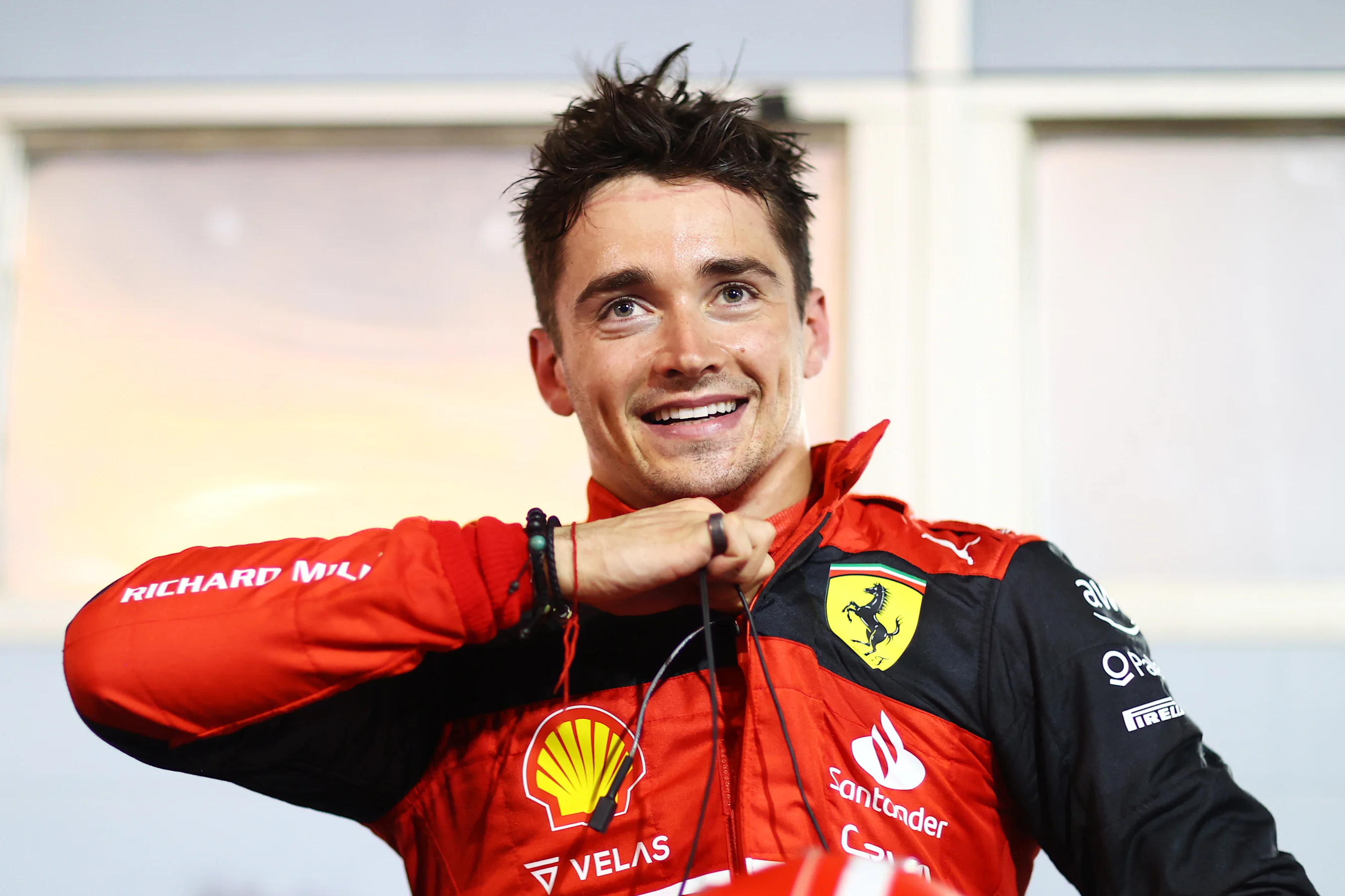 BAHRAIN, BAHRAIN - MARCH 20: Race winner Charles Leclerc of Monaco and Ferrari smiles in parc ferme