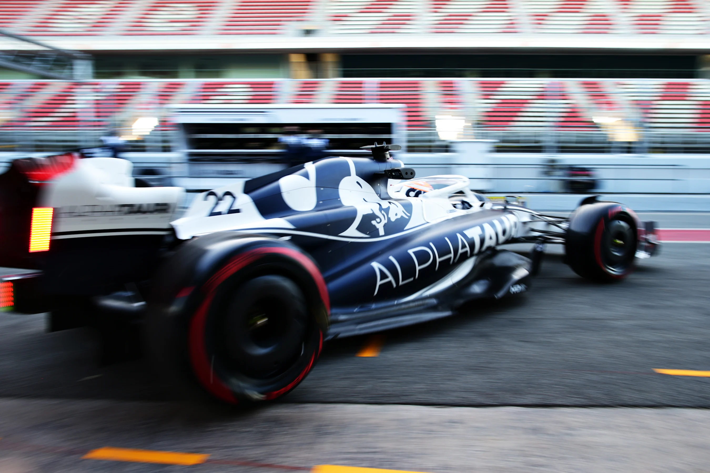BARCELONA, SPAIN - FEBRUARY 23: Yuki Tsunoda of Japan driving the (22) Scuderia AlphaTauri AT03