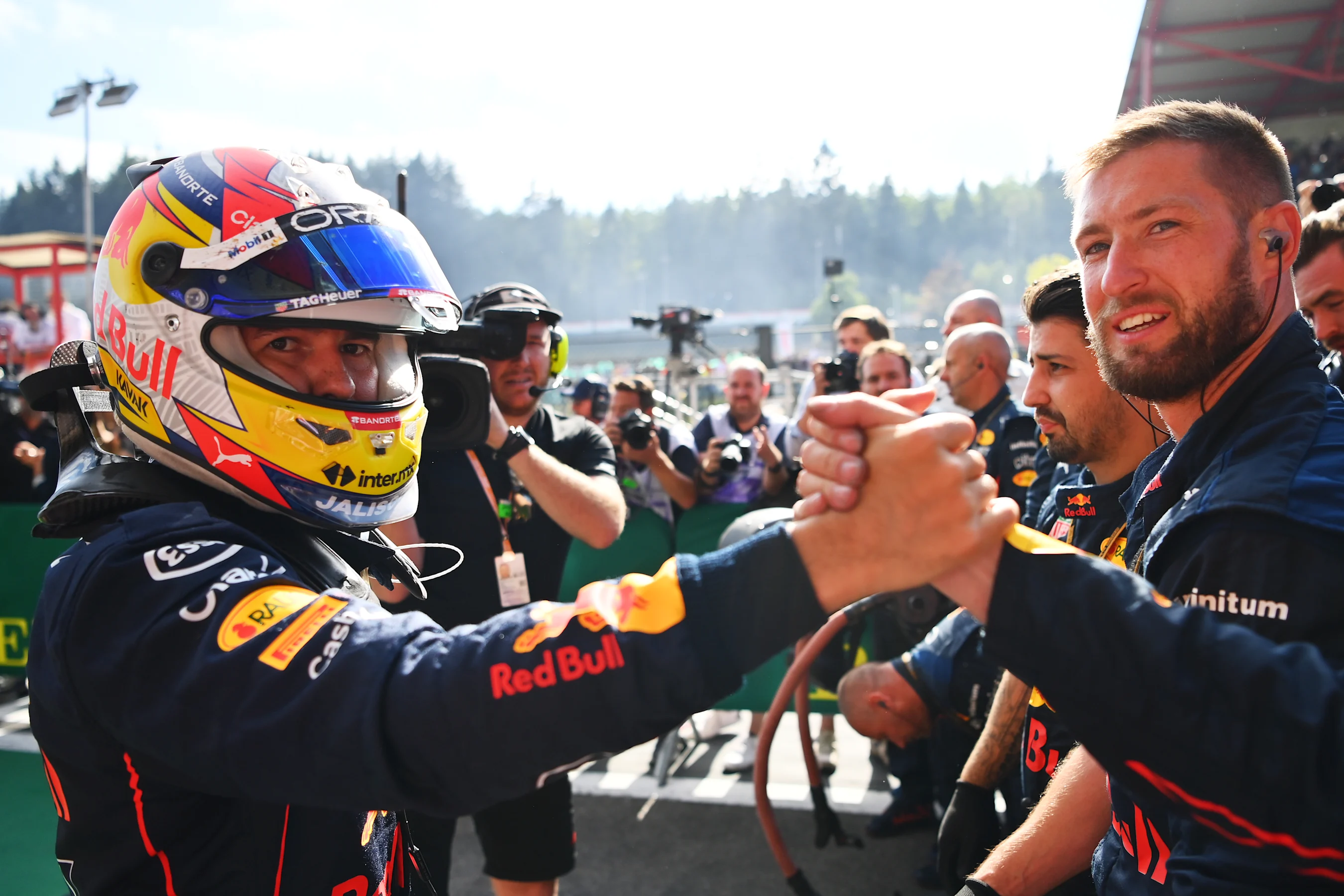 SPA, BELGIUM - AUGUST 28: Second placed Sergio Perez of Mexico and Oracle Red Bull Racing