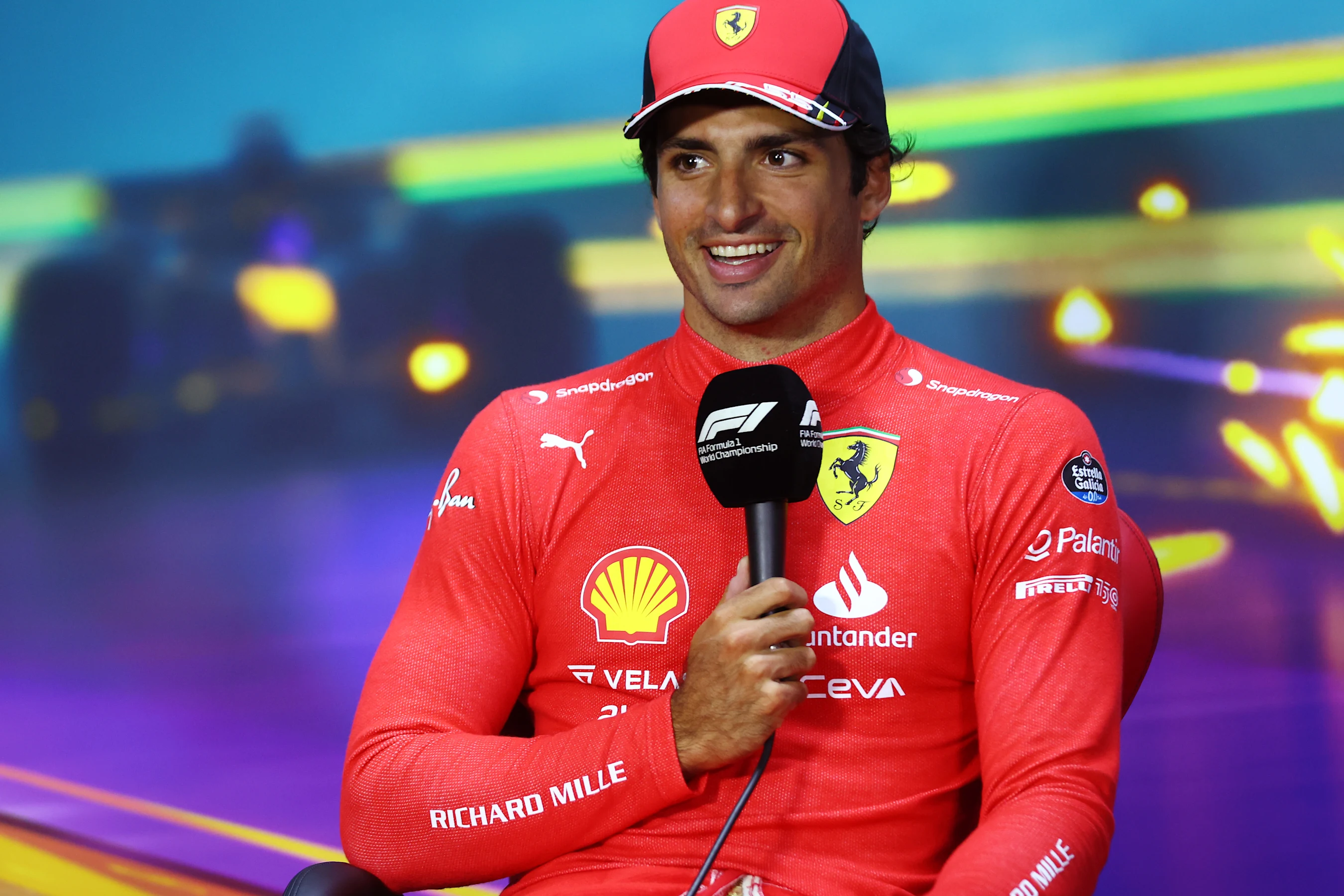 SAO PAULO, BRAZIL - NOVEMBER 12: Second placed Carlos Sainz of Spain and Ferrari talks in a press