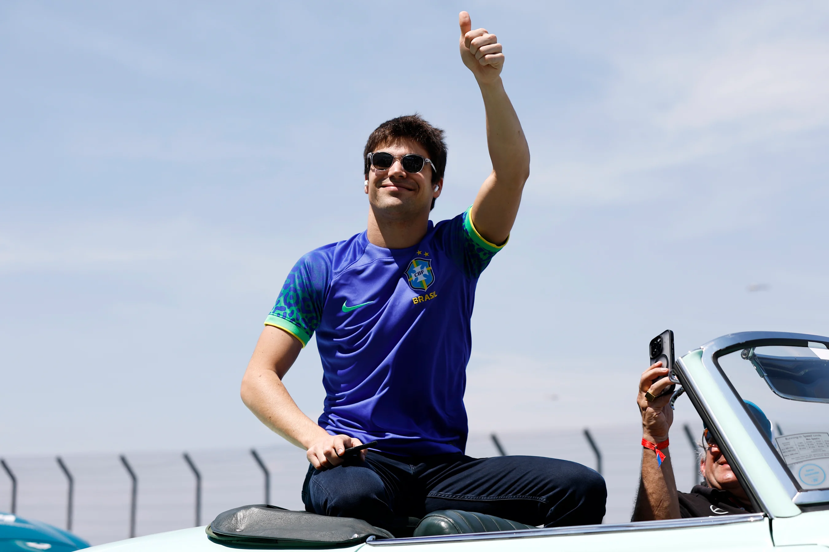 SAO PAULO, BRAZIL - NOVEMBER 13: Lance Stroll of Canada and Aston Martin F1 Team waves to the crowd