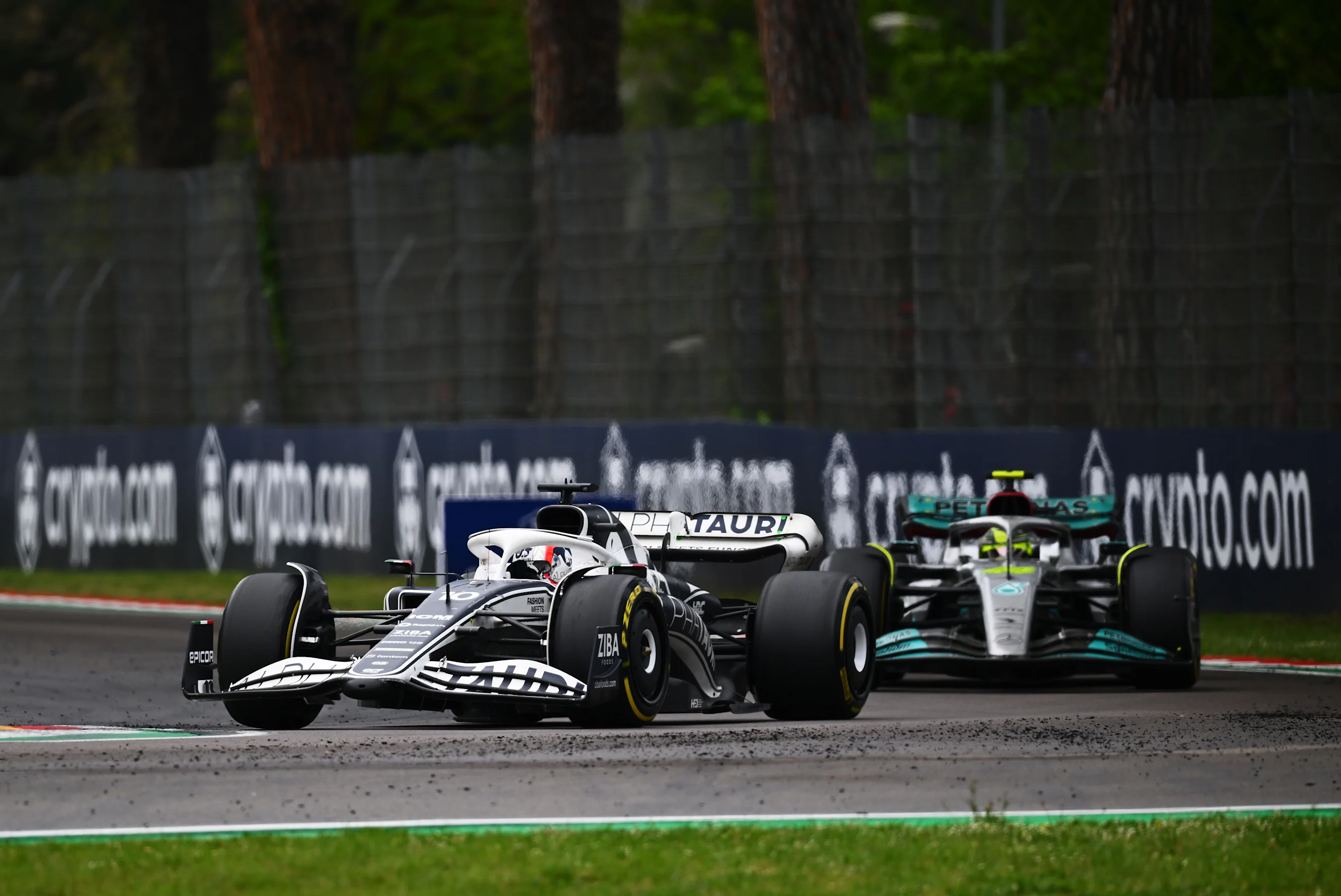 IMOLA, ITALY - APRIL 24: Pierre Gasly of France driving the (10) Scuderia AlphaTauri AT03 leads