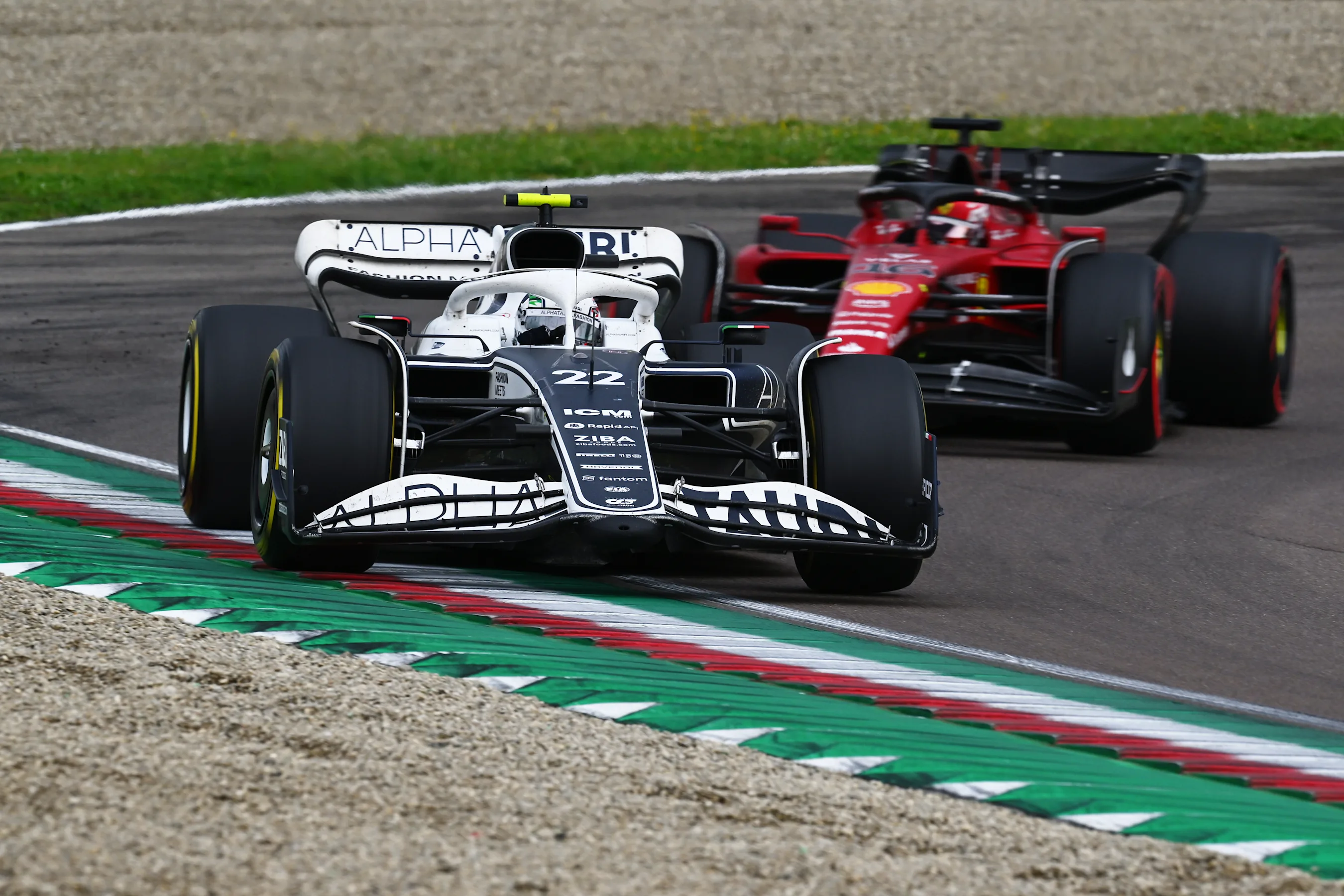 IMOLA, ITALY - APRIL 24: Yuki Tsunoda of Japan driving the (22) Scuderia AlphaTauri AT03 leads