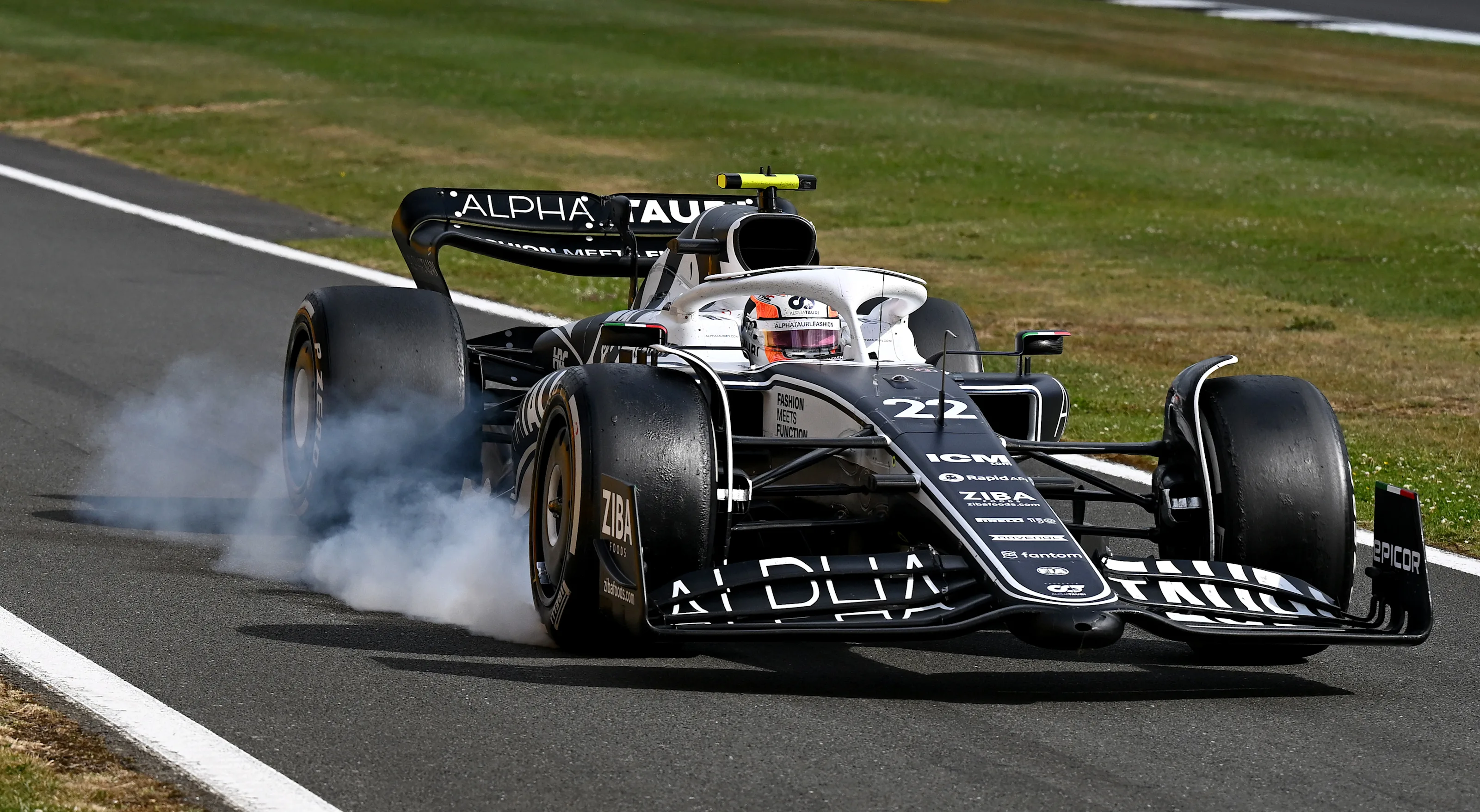 NORTHAMPTON, ENGLAND - JULY 03: Yuki Tsunoda of Japan driving the (22) Scuderia AlphaTauri AT03