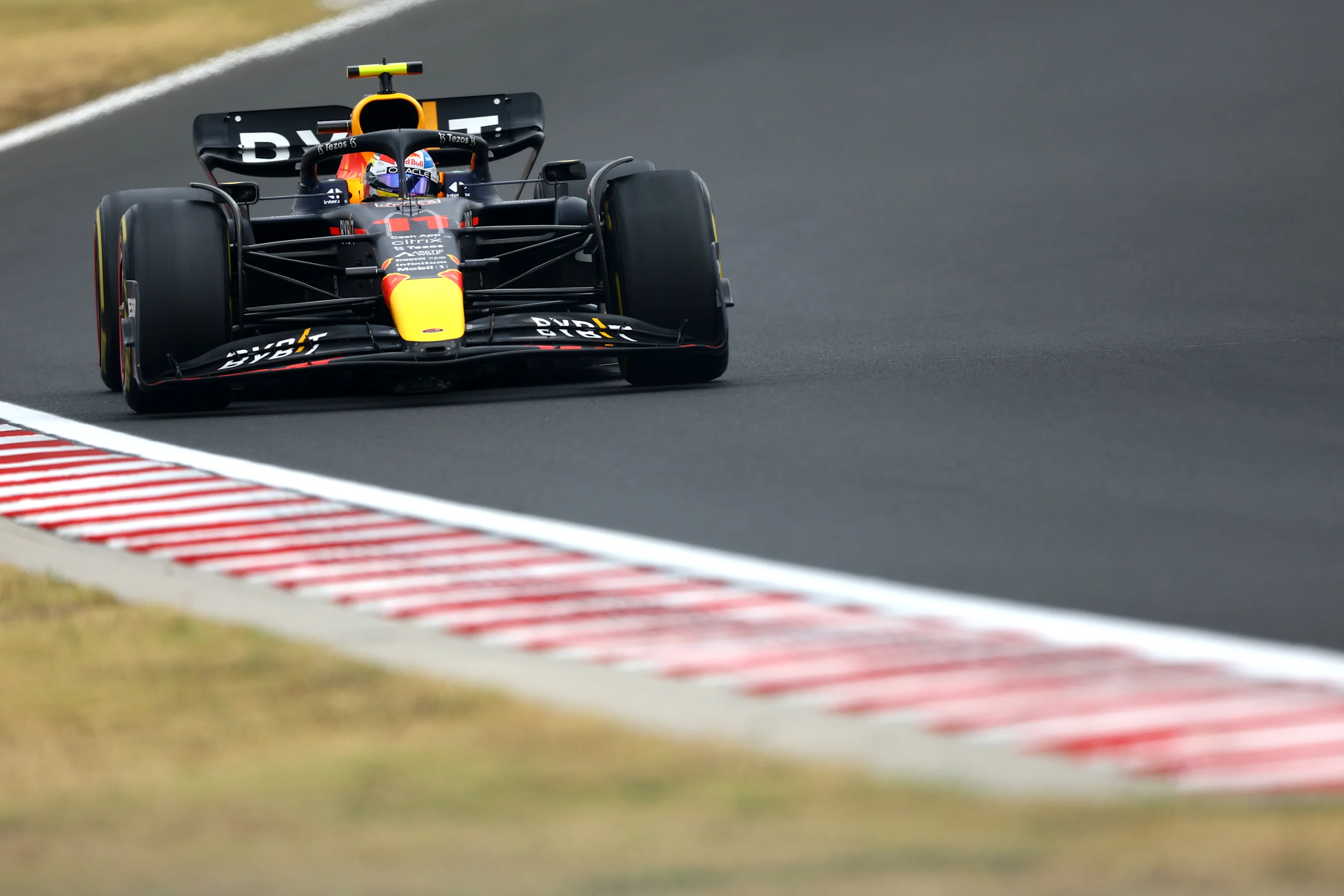 BUDAPEST, HUNGARY - JULY 31: Sergio Perez of Mexico driving the (11) Oracle Red Bull Racing RB18 on