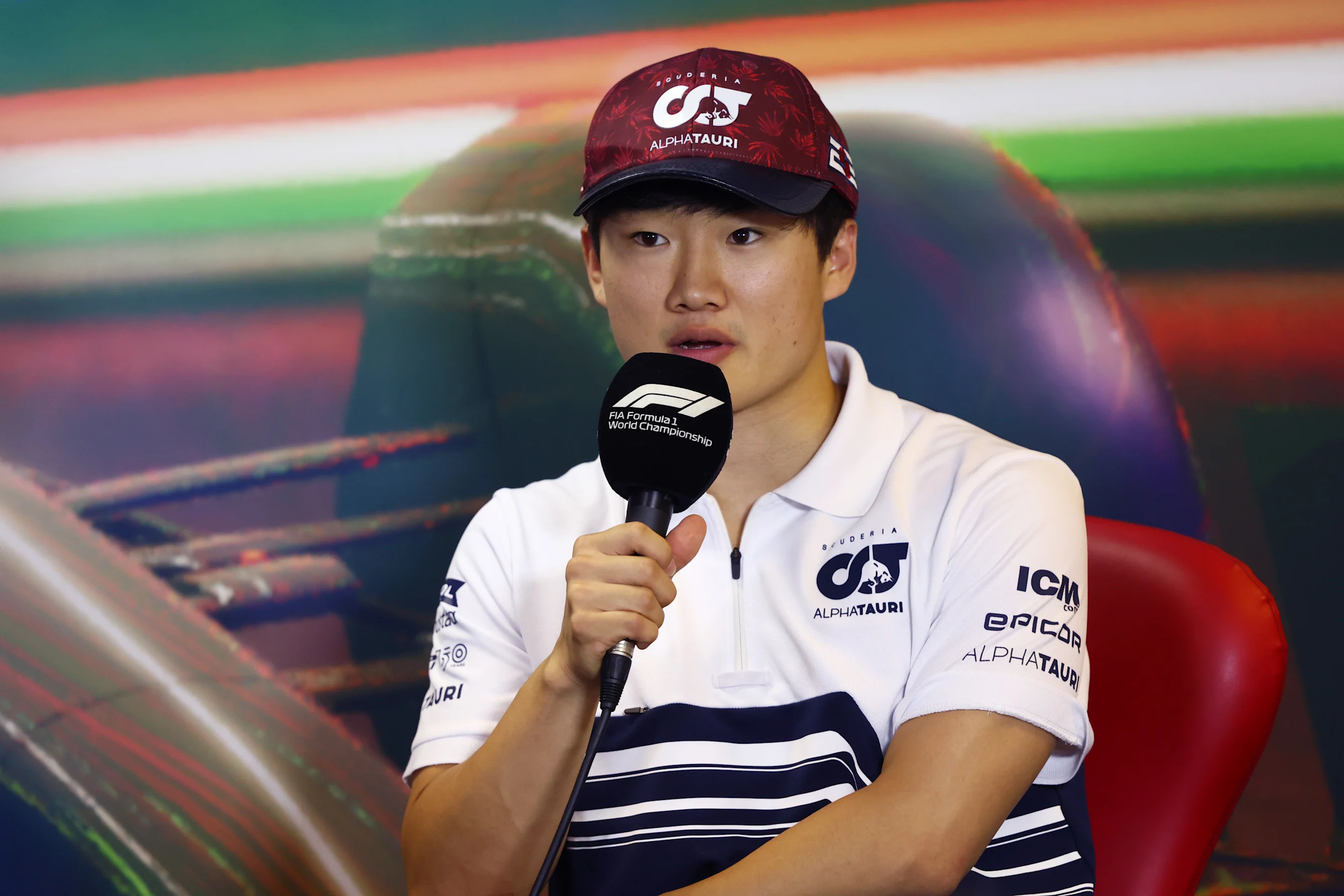 BUDAPEST, HUNGARY - JULY 28: Yuki Tsunoda of Japan and Scuderia AlphaTauri talks in the Drivers