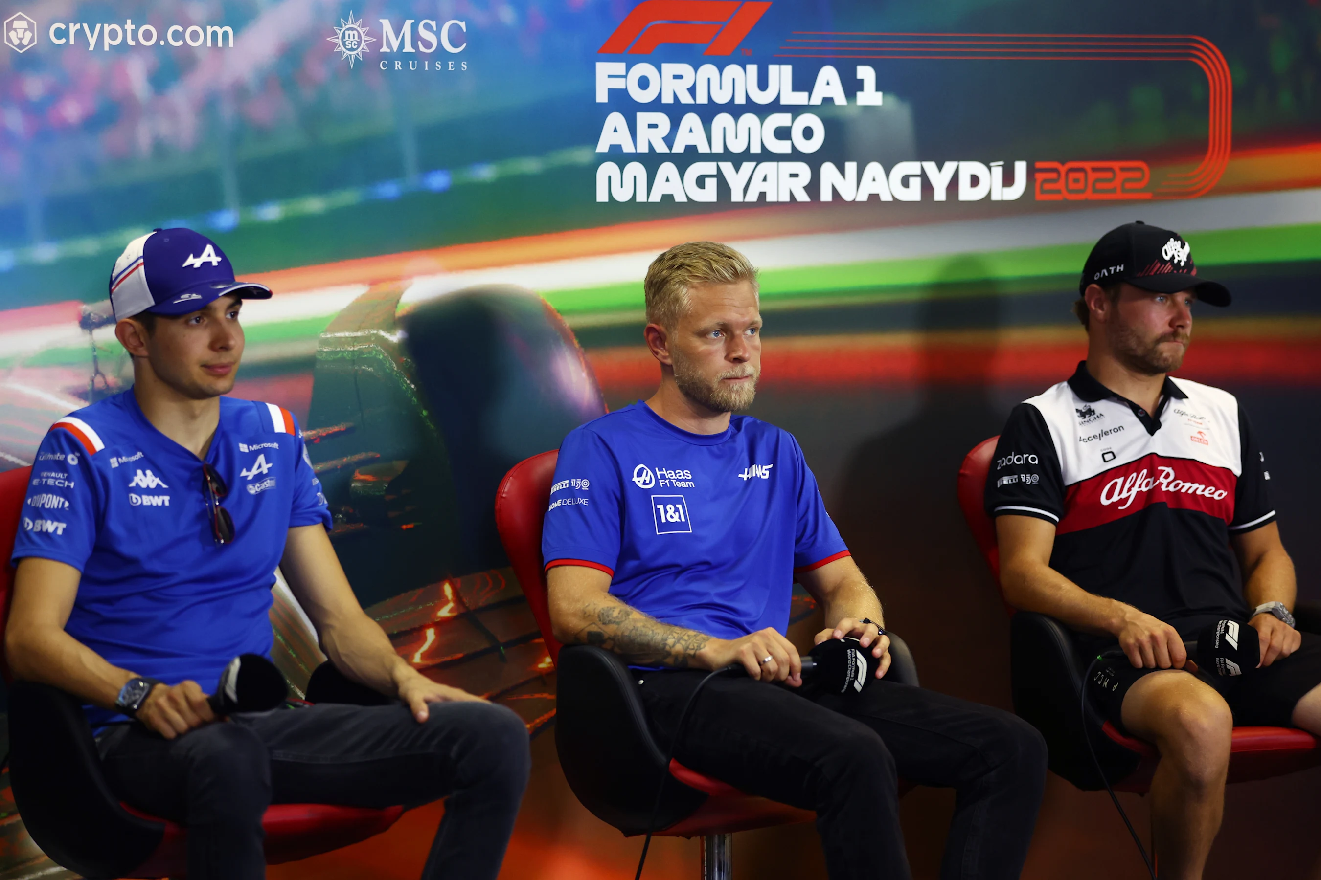 BUDAPEST, HUNGARY - JULY 28: Esteban Ocon of France and Alpine F1, Kevin Magnussen of Denmark and