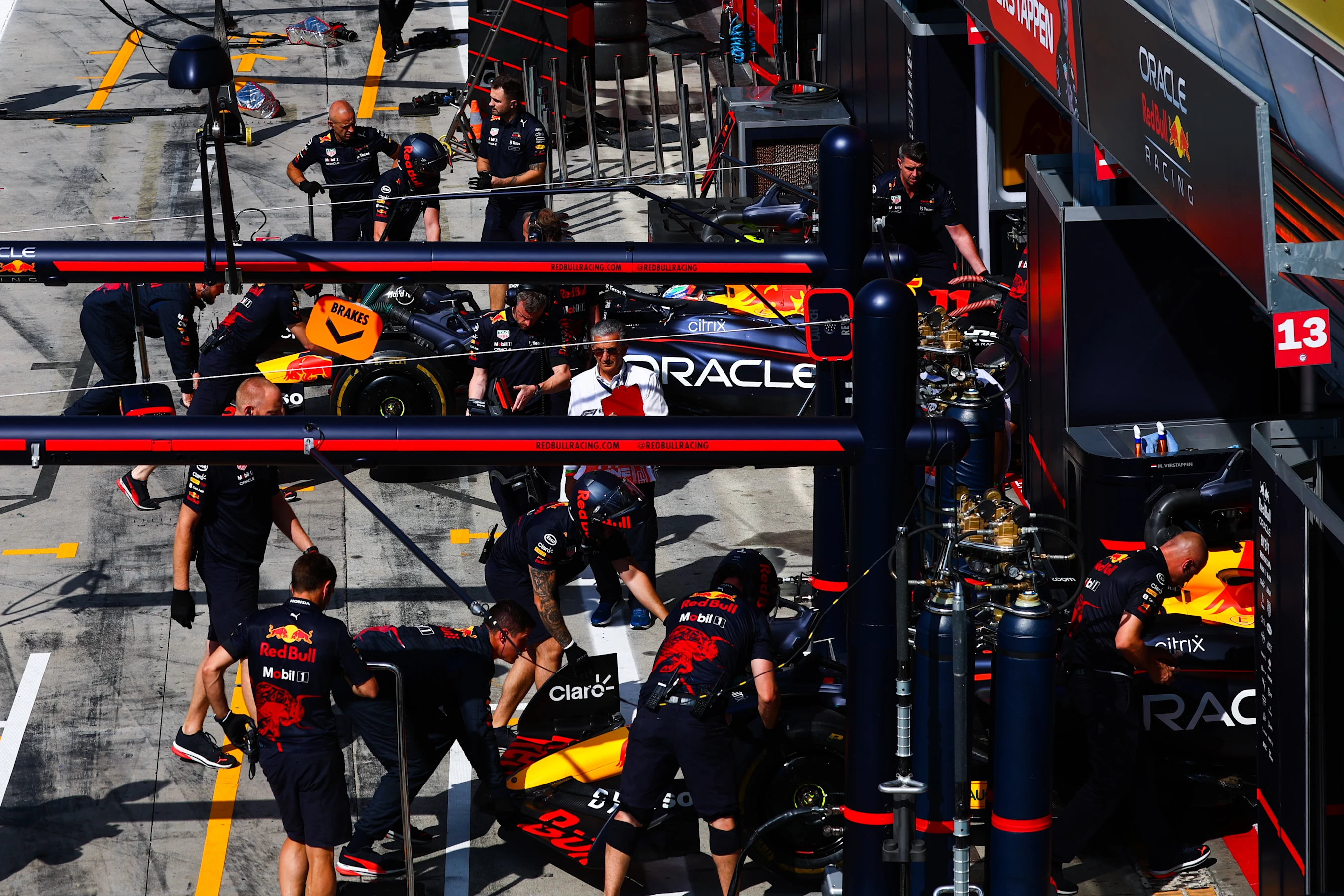 MONZA, ITALY - SEPTEMBER 09: The Red Bull Racing team work in the Pitlane during practice ahead of