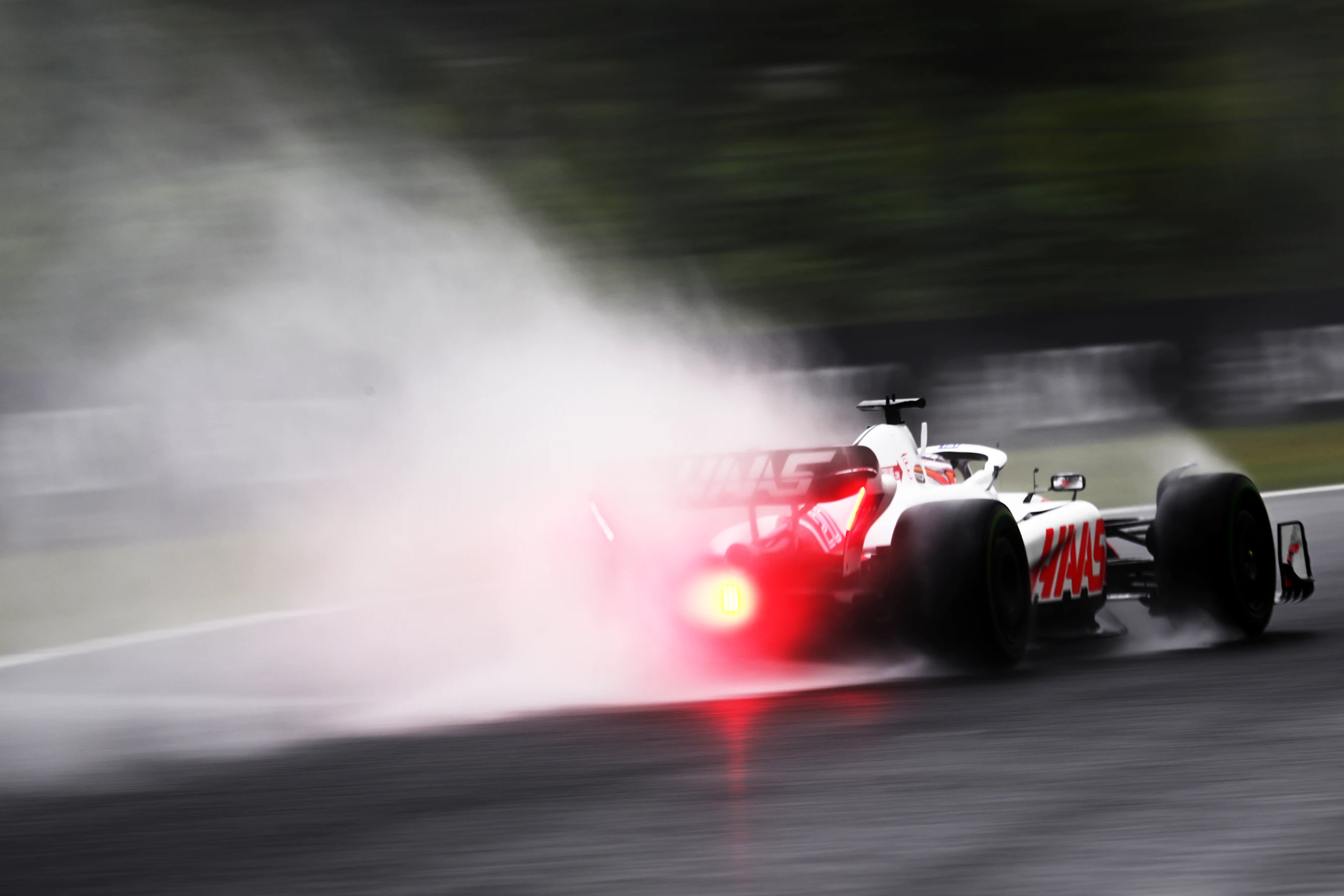 SUZUKA, JAPAN - OCTOBER 07: Kevin Magnussen of Denmark driving the (20) Haas F1 VF-22 Ferrari on