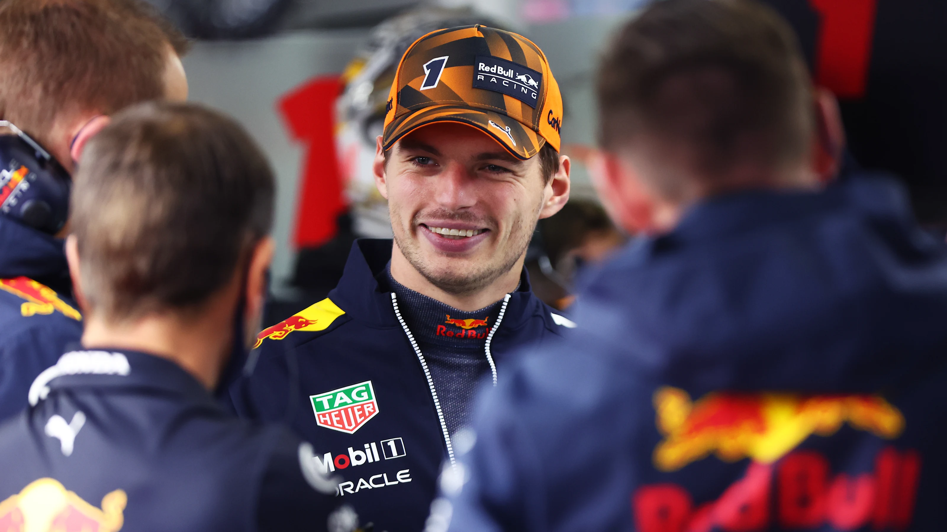 SUZUKA, JAPAN - OCTOBER 07: Max Verstappen of the Netherlands and Oracle Red Bull Racing talks with