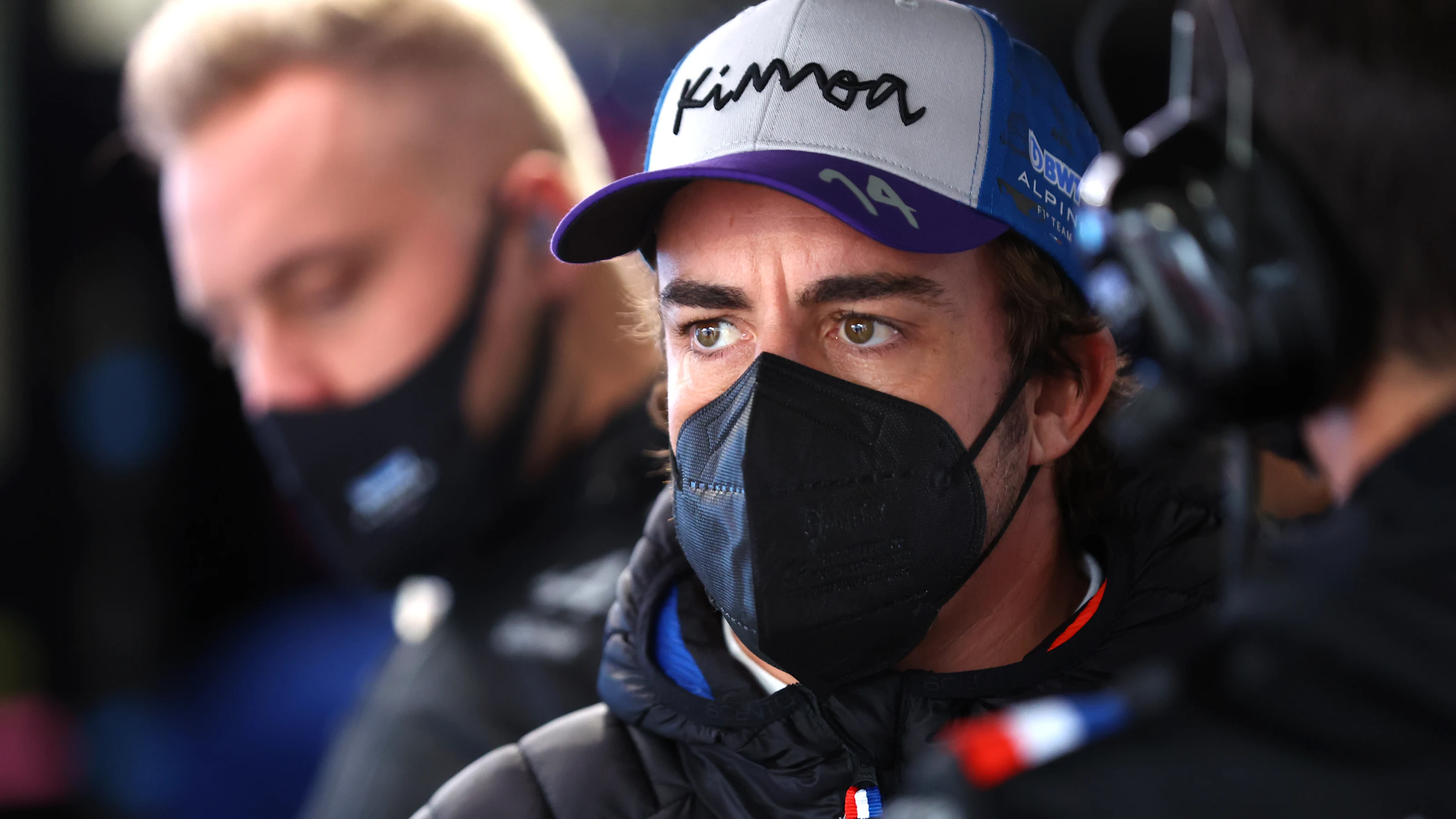 SUZUKA, JAPAN - OCTOBER 07: Fernando Alonso of Spain and Alpine F1 looks on in the garage during