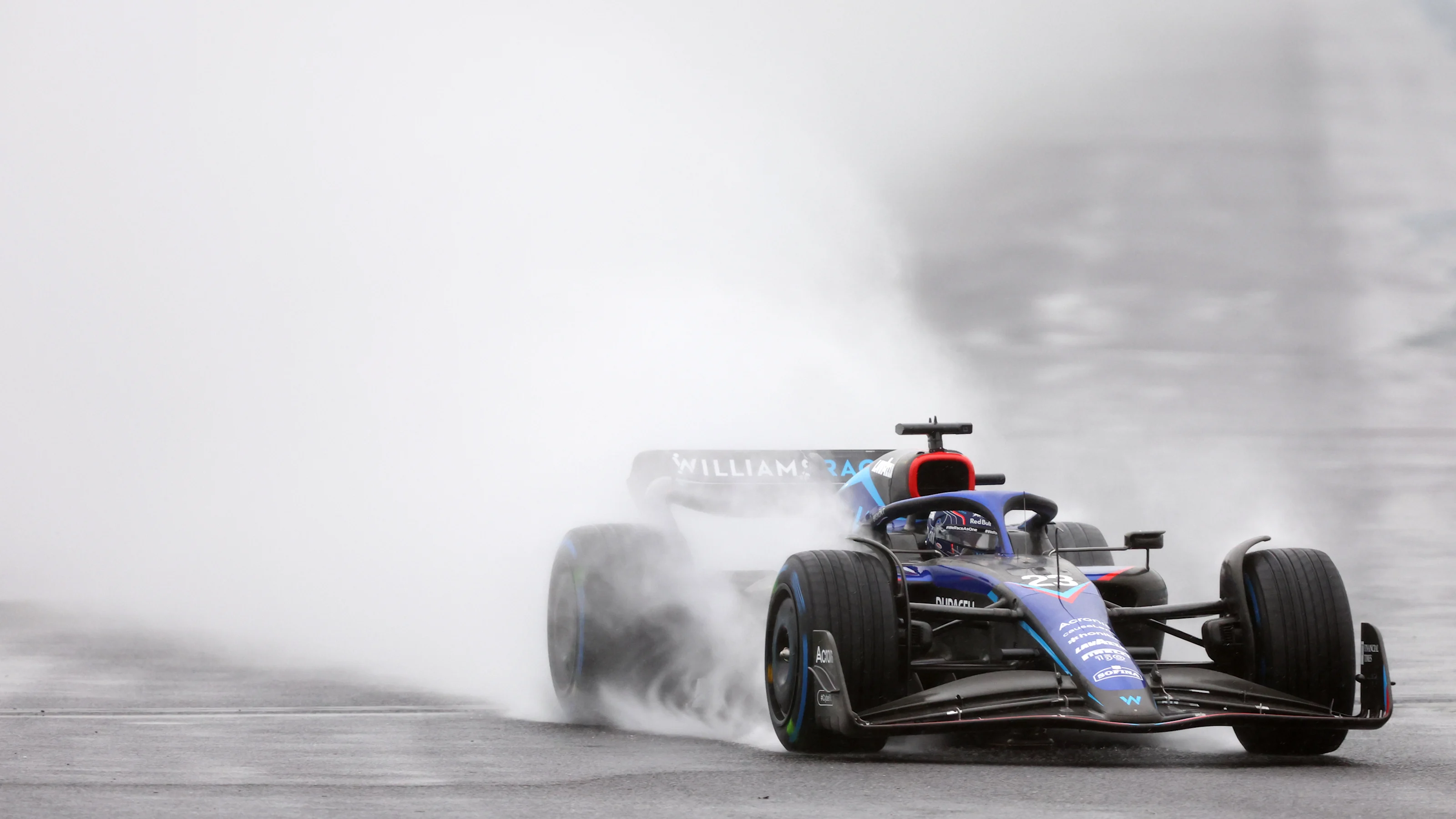 SUZUKA, JAPAN - OCTOBER 07: Alexander Albon of Thailand driving the (23) Williams FW44 Mercedes on