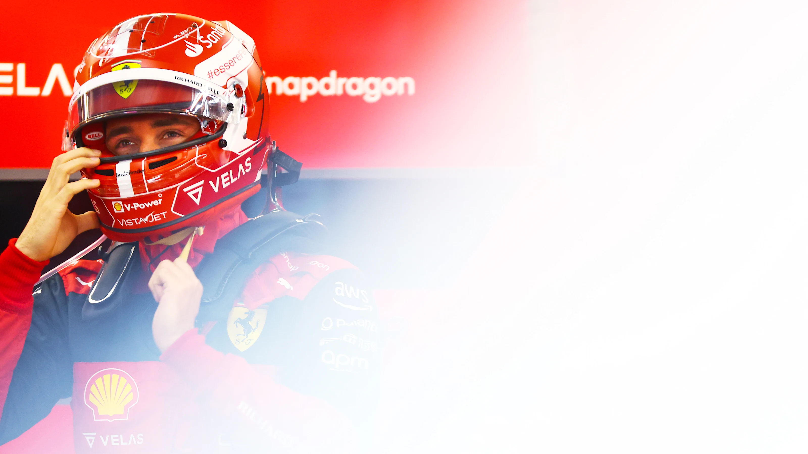 SUZUKA, JAPAN - OCTOBER 07: Charles Leclerc of Monaco and Ferrari prepares to drive in the garage