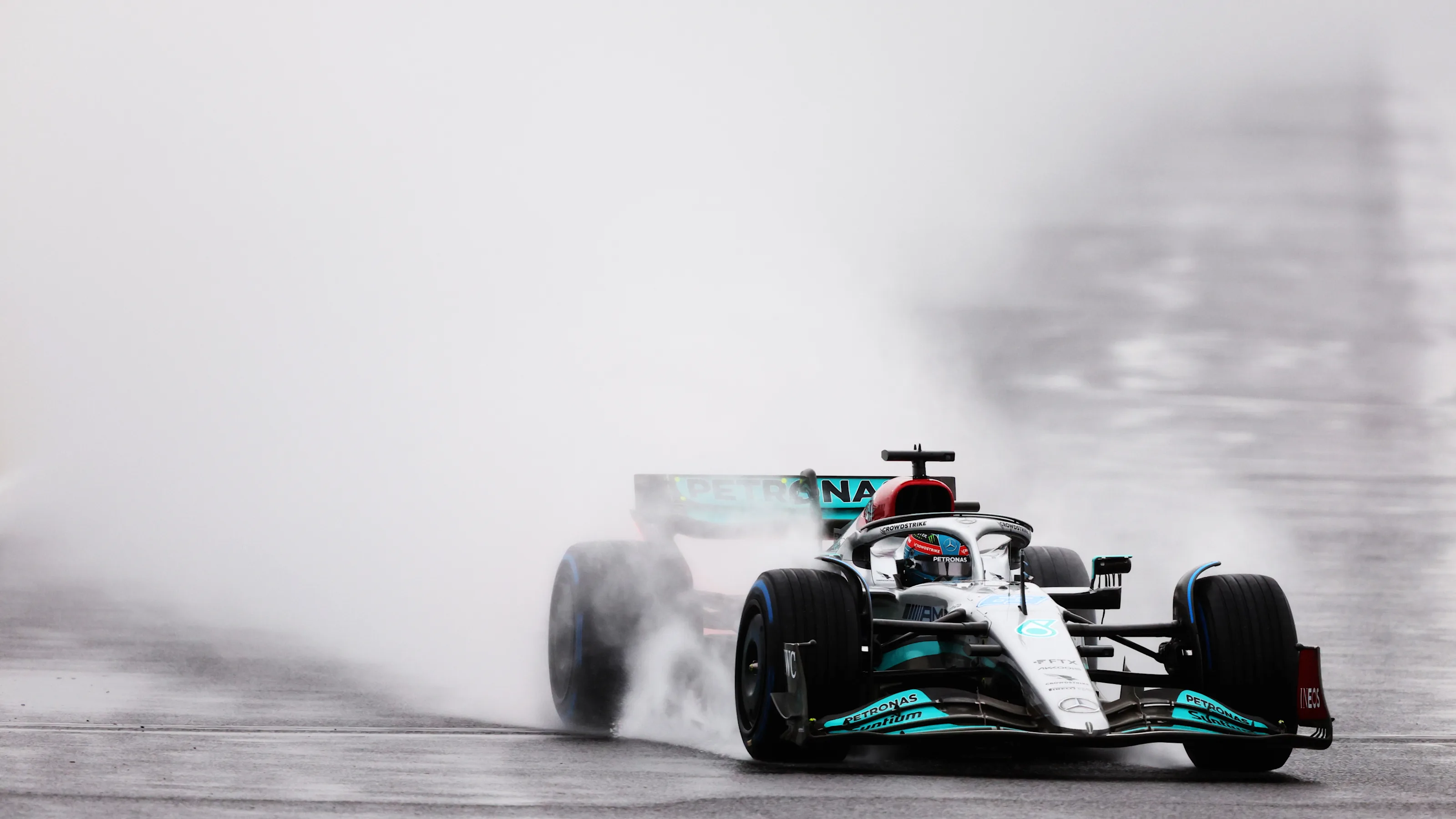 SUZUKA, JAPAN - OCTOBER 07: George Russell of Great Britain driving the (63) Mercedes AMG Petronas