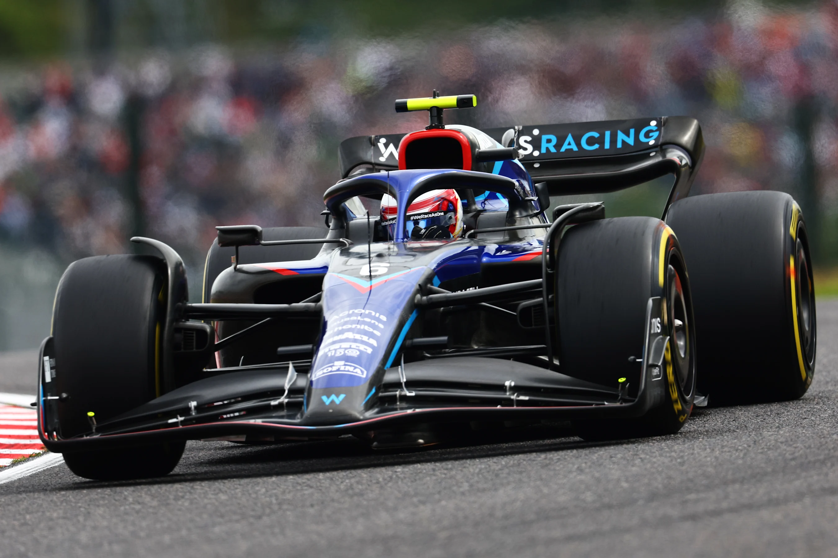 SUZUKA, JAPAN - OCTOBER 08: Nicholas Latifi of Canada driving the (6) Williams FW44 Mercedes on