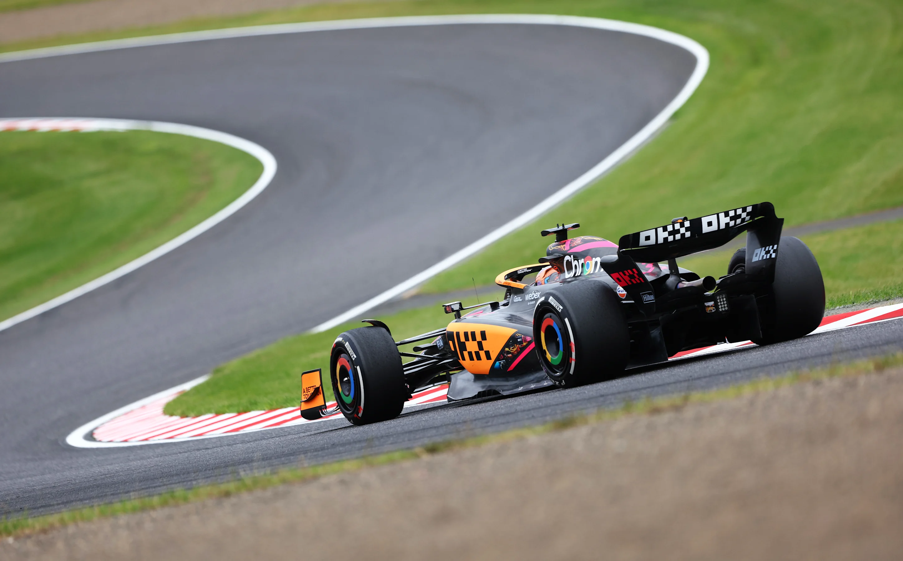 SUZUKA, JAPAN - OCTOBER 08: Daniel Ricciardo of Australia driving the (3) McLaren MCL36 Mercedes on