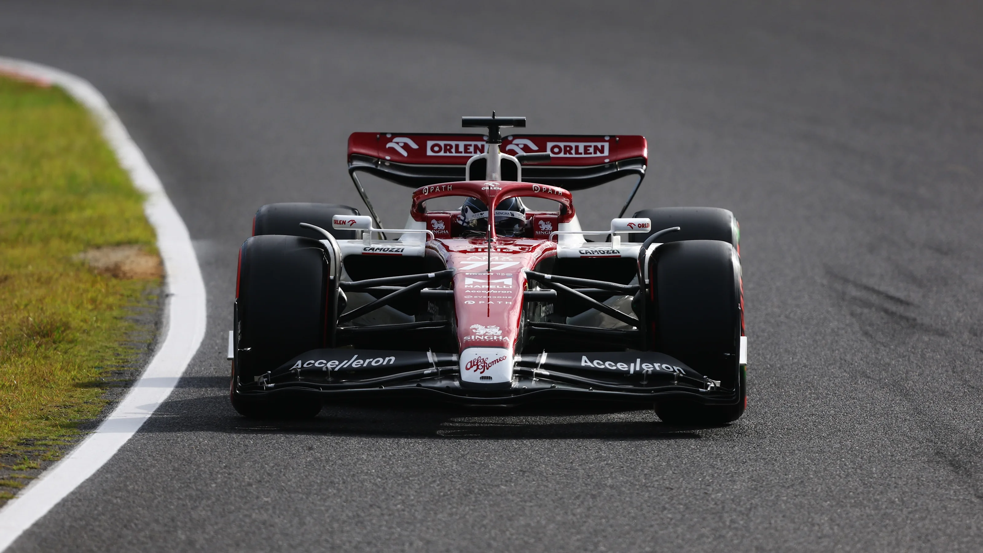 SUZUKA, JAPAN - OCTOBER 08: Valtteri Bottas of Finland driving the (77) Alfa Romeo F1 C42 Ferrari