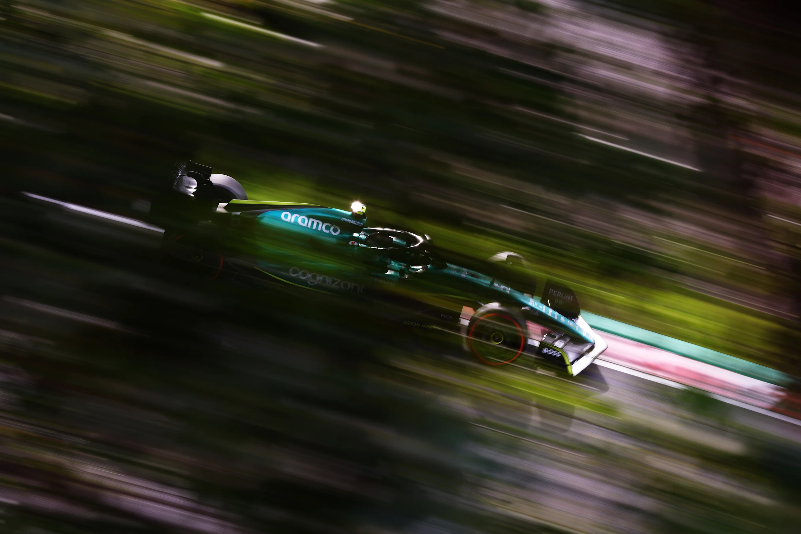 SUZUKA, JAPAN - OCTOBER 08: Sebastian Vettel of Germany driving the (5) Aston Martin AMR22 Mercedes