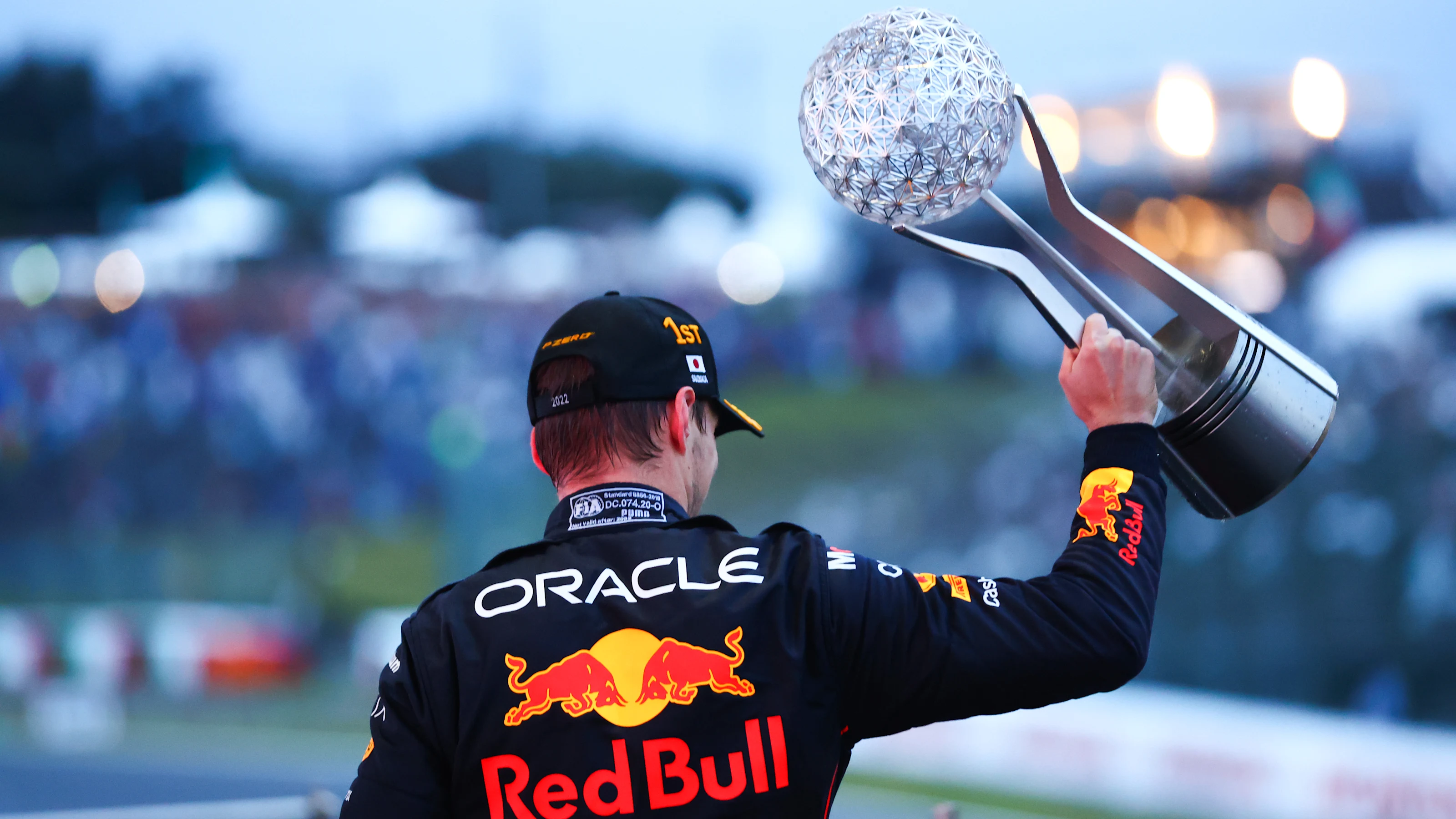 SUZUKA, JAPAN - OCTOBER 09: Race winner and 2022 F1 World Drivers Champion Max Verstappen of the