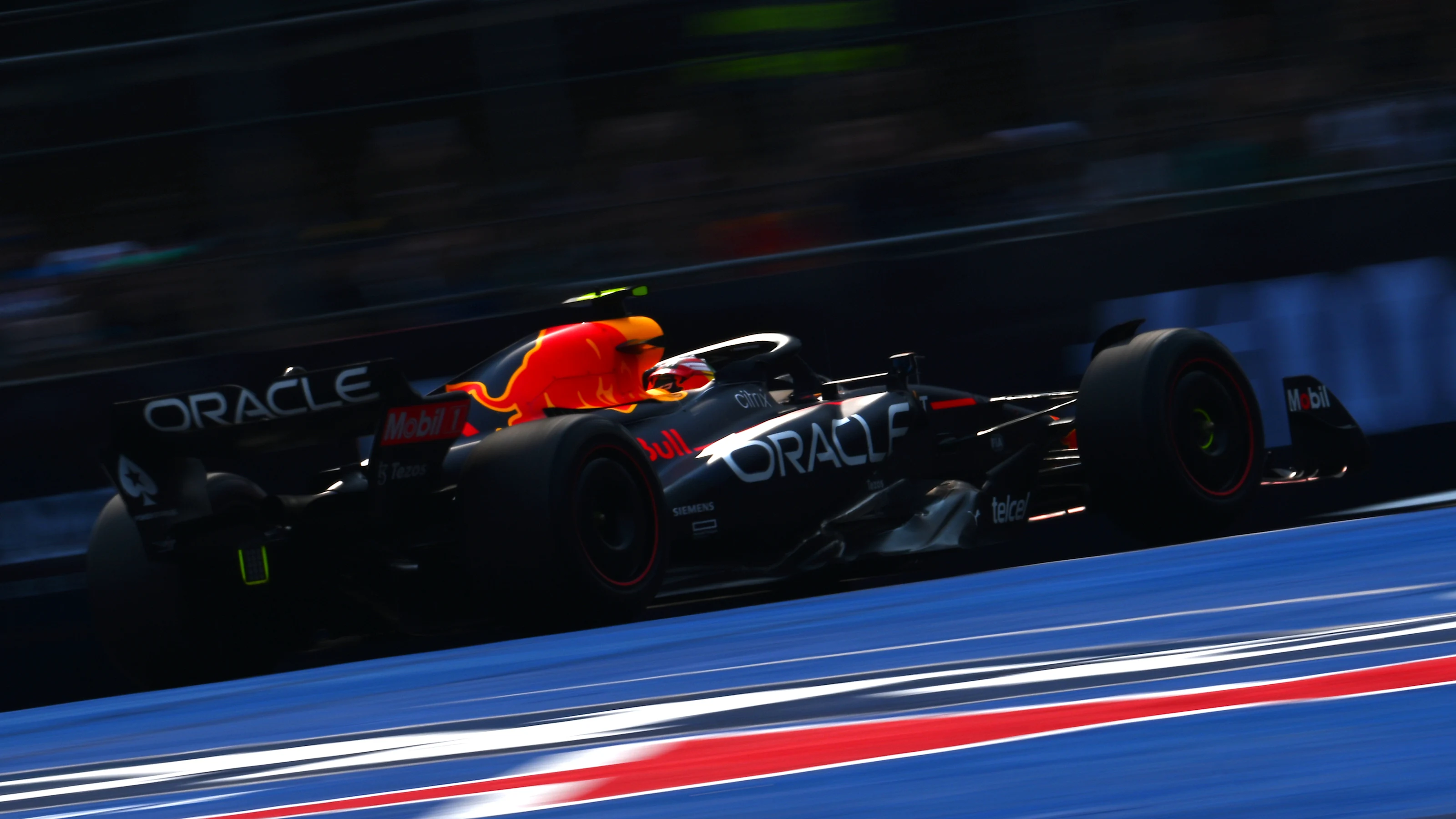 MEXICO CITY, MEXICO - OCTOBER 28: Sergio Perez of Mexico driving the (11) Oracle Red Bull Racing