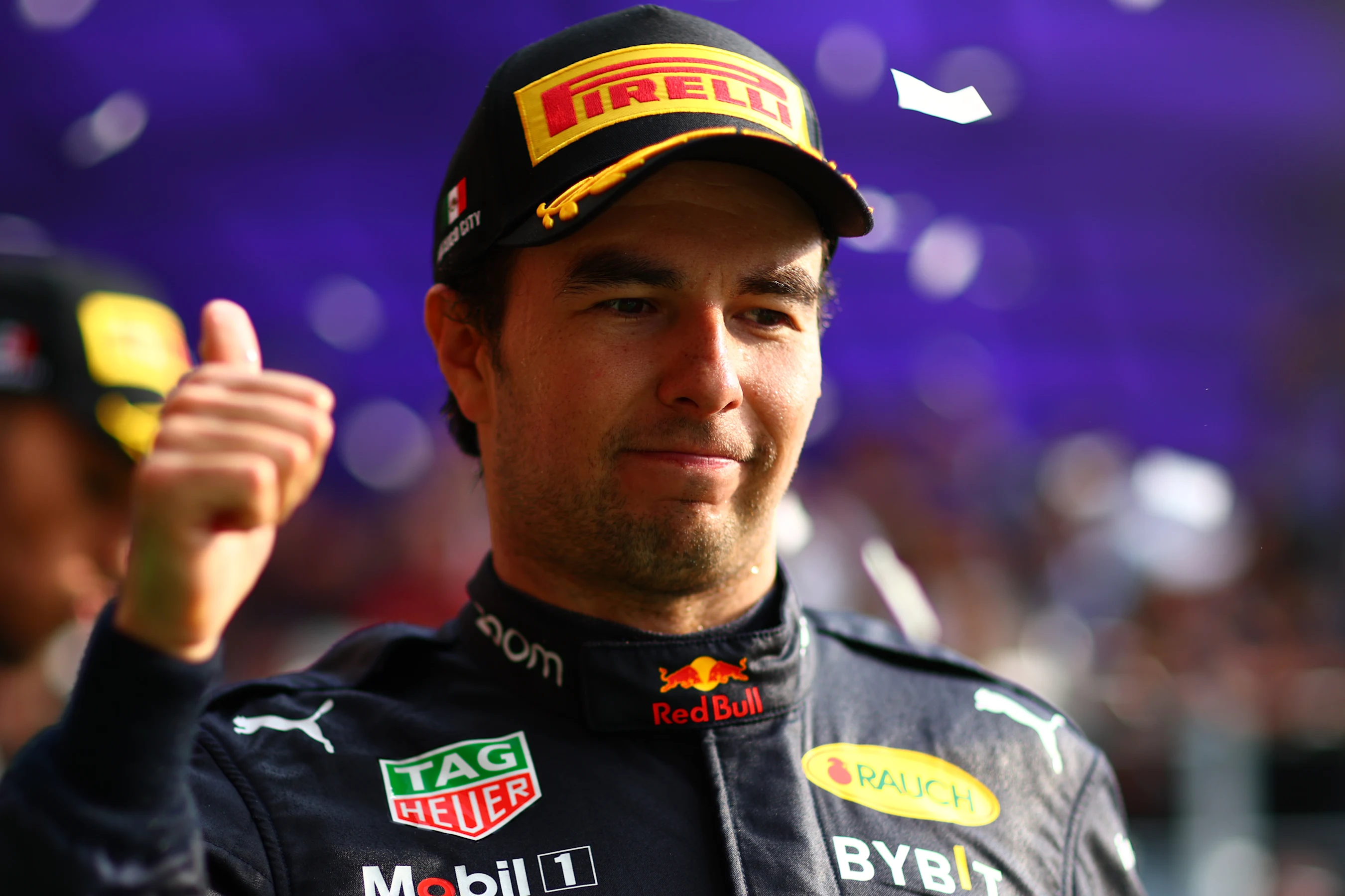 MEXICO CITY, MEXICO - OCTOBER 30: Third placed Sergio Perez of Mexico and Oracle Red Bull Racing