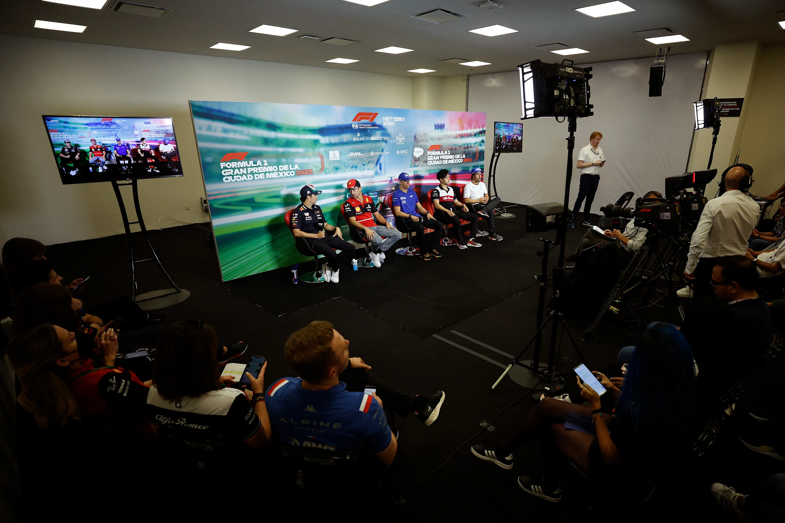 MEXICO CITY, MEXICO - OCTOBER 27: (L-R) Sergio Perez of Mexico and Oracle Red Bull Racing, Charles