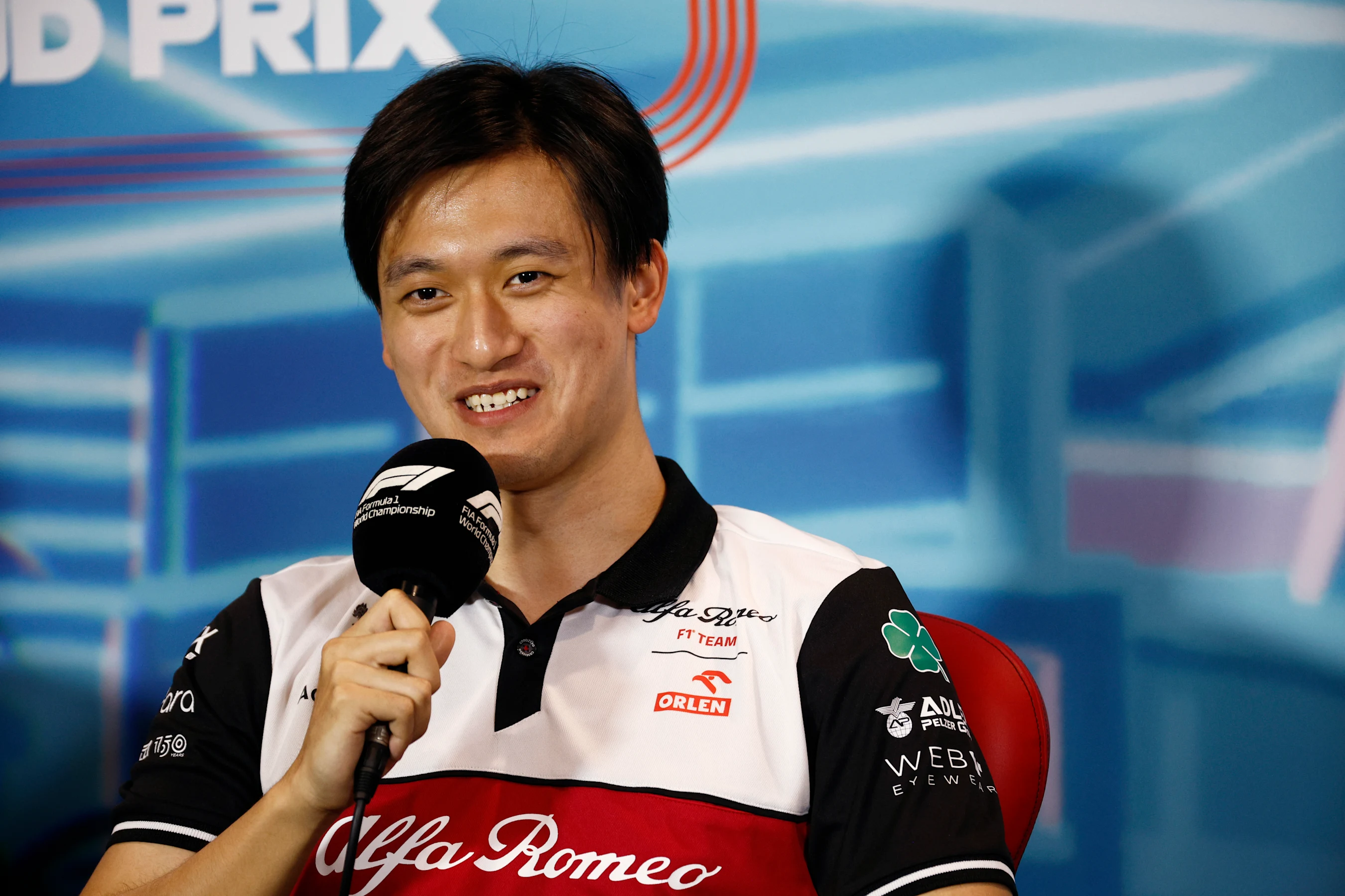 MIAMI, FLORIDA - MAY 06: Zhou Guanyu of China and Alfa Romeo F1 talks in the Drivers Press