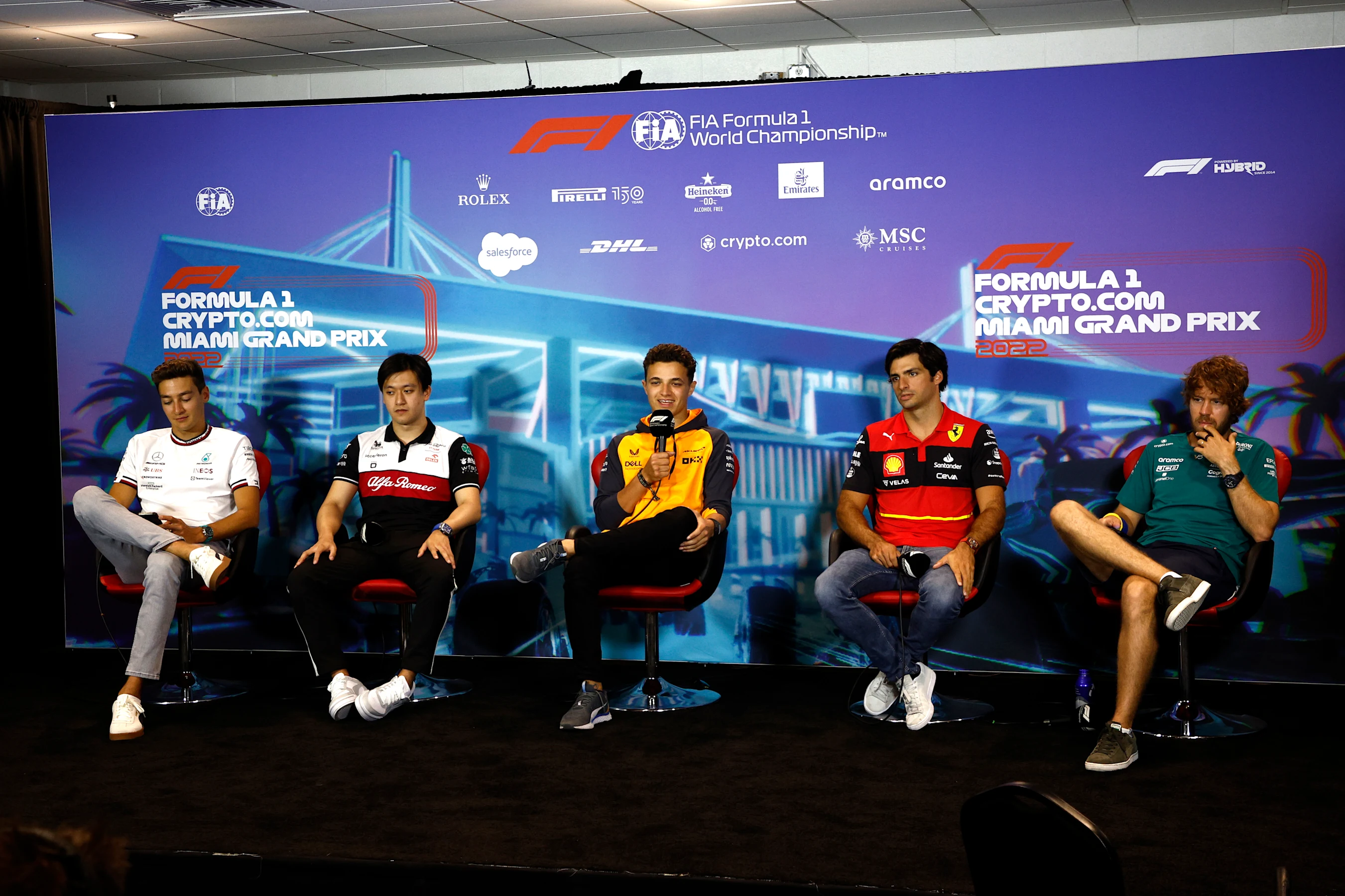MIAMI, FLORIDA - MAY 06: (L-R) George Russell of Great Britain and Mercedes, Zhou Guanyu of China