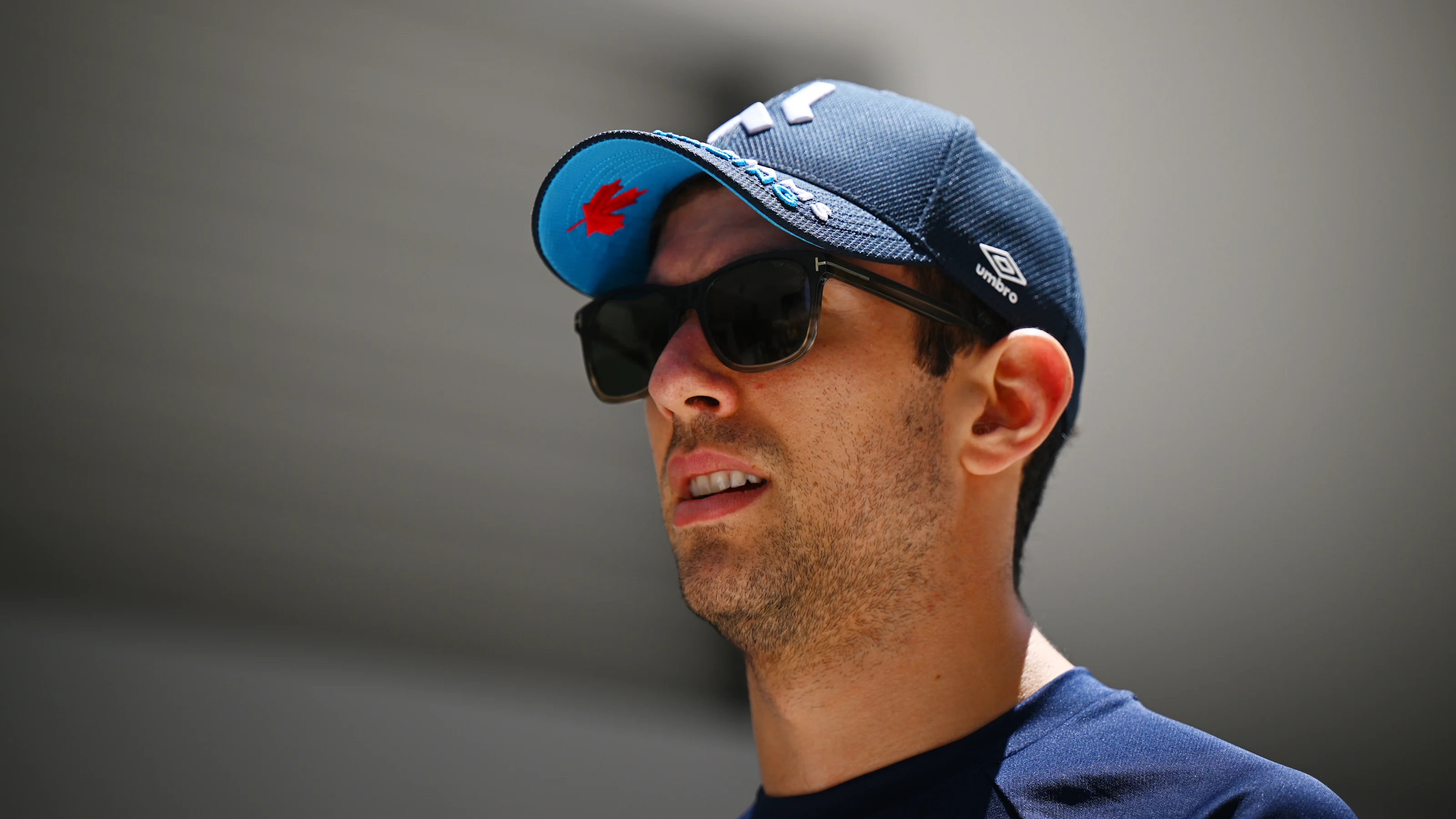 MIAMI, FLORIDA - MAY 06: Nicholas Latifi of Canada and Williams walks in the Paddock prior to