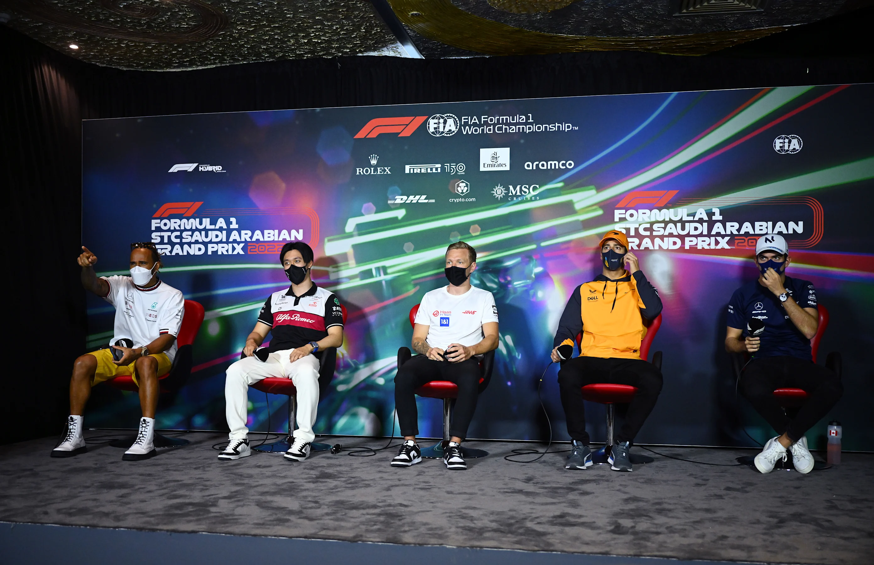 JEDDAH, SAUDI ARABIA - MARCH 25: (L-R) Lewis Hamilton of Great Britain and Mercedes, Zhou Guanyu of