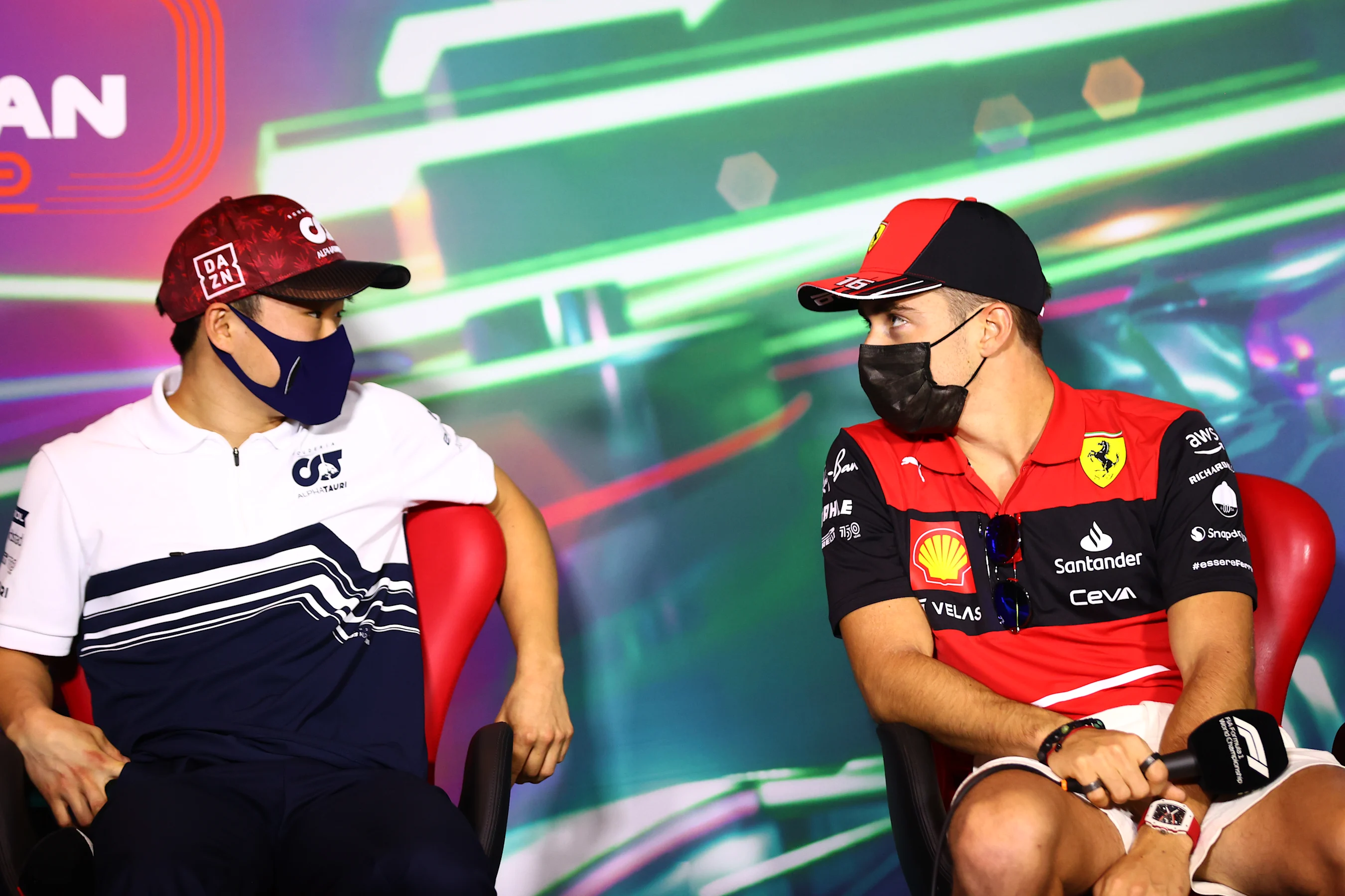 JEDDAH, SAUDI ARABIA - MARCH 25: Yuki Tsunoda of Japan and Scuderia AlphaTauri and Charles Leclerc