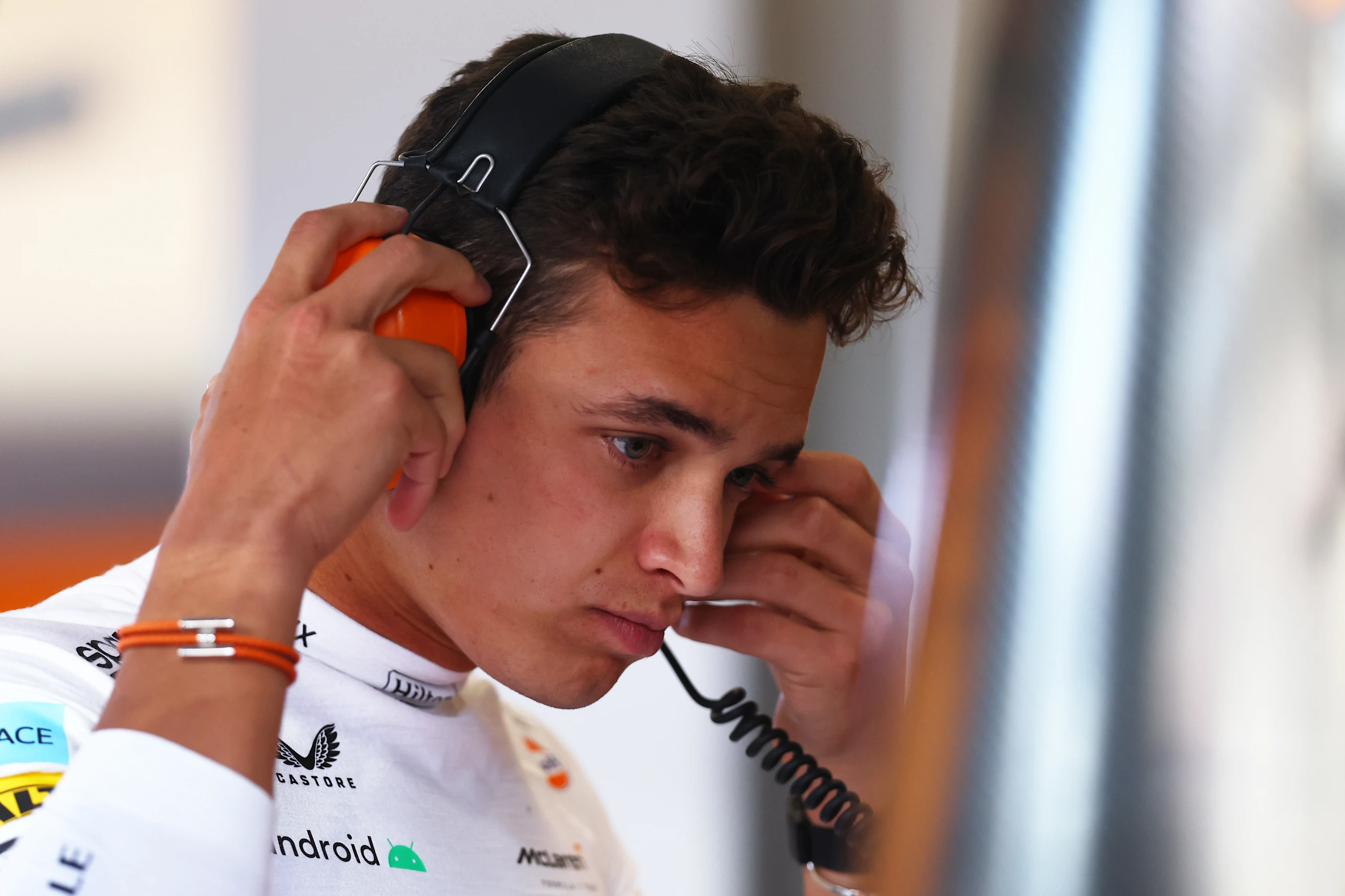 JEDDAH, SAUDI ARABIA - MARCH 25: Lando Norris of Great Britain and McLaren looks on in the garage