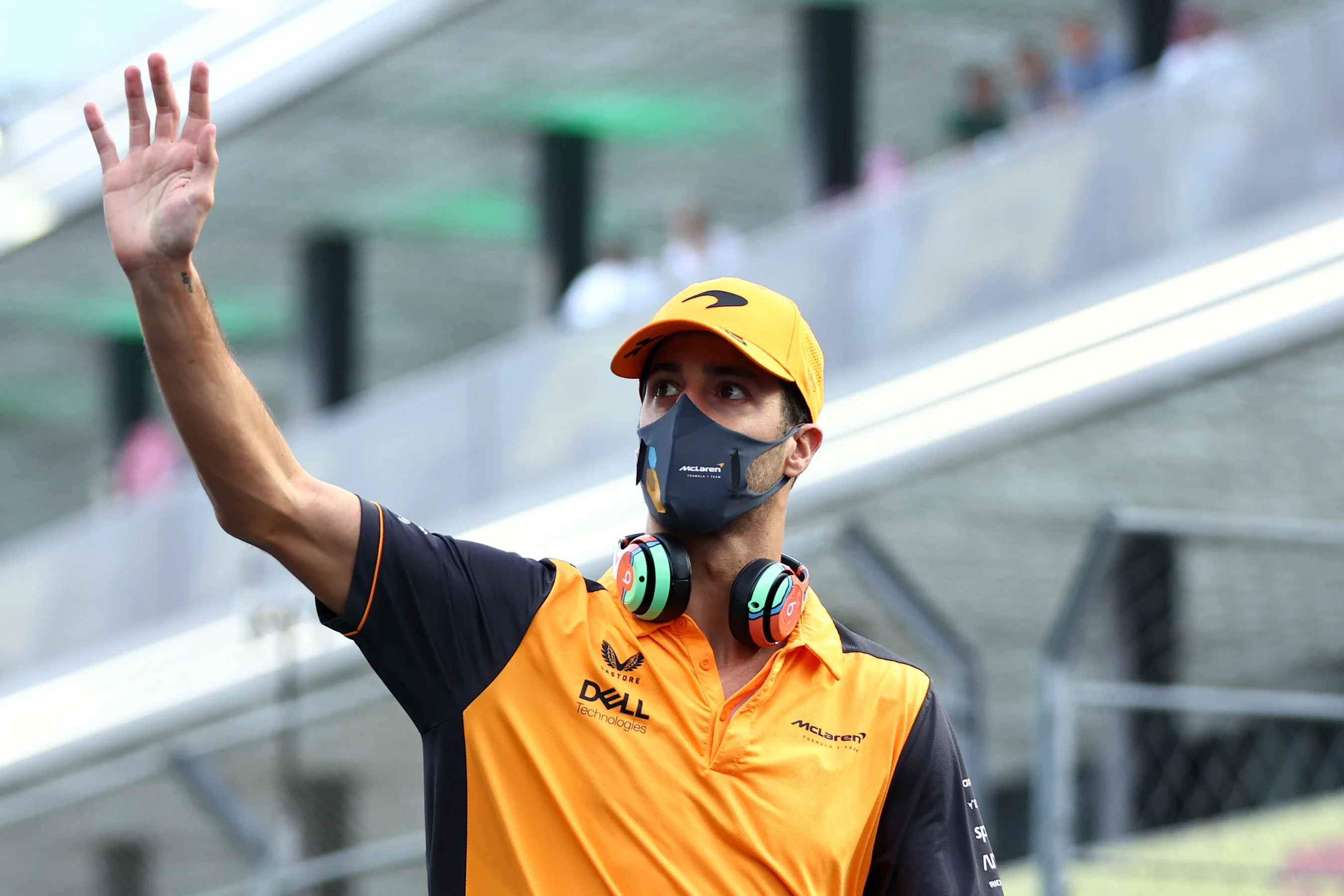 JEDDAH, SAUDI ARABIA - MARCH 27: Daniel Ricciardo of Australia and McLaren waves to the crowd on