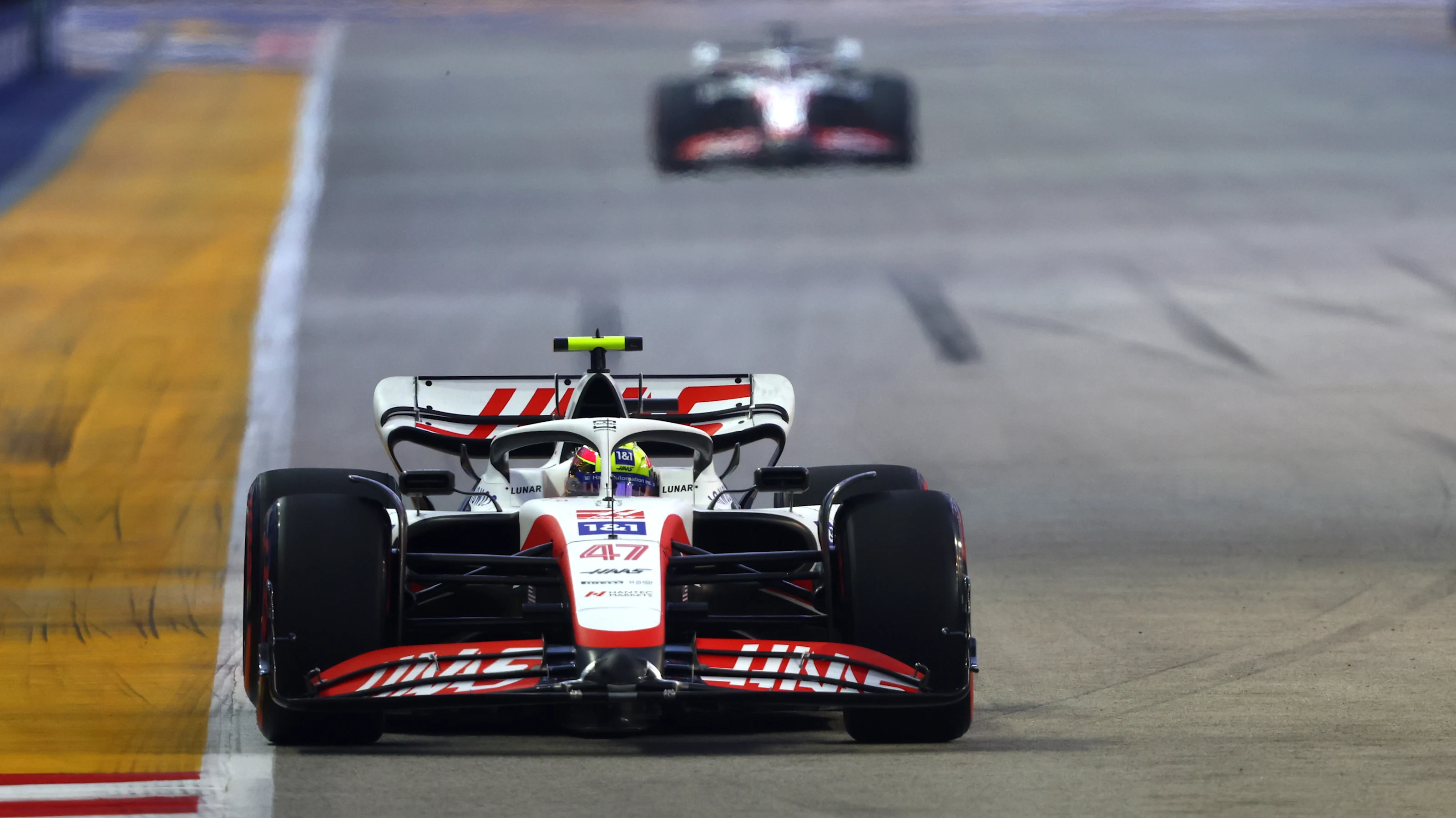 SINGAPORE, SINGAPORE - SEPTEMBER 30: Mick Schumacher of Germany driving the (47) Haas F1 VF-22