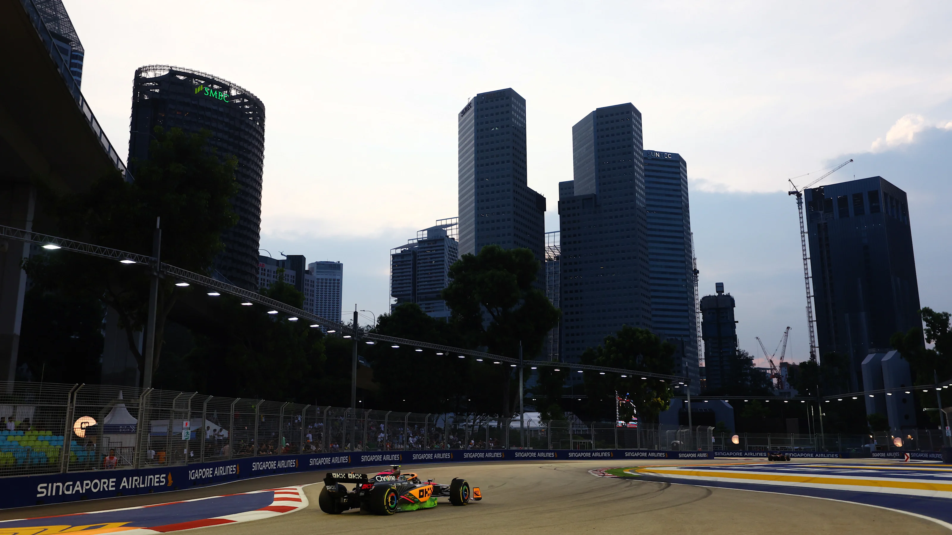 SINGAPORE, SINGAPORE - SEPTEMBER 30: Lando Norris of Great Britain driving the (4) McLaren MCL36