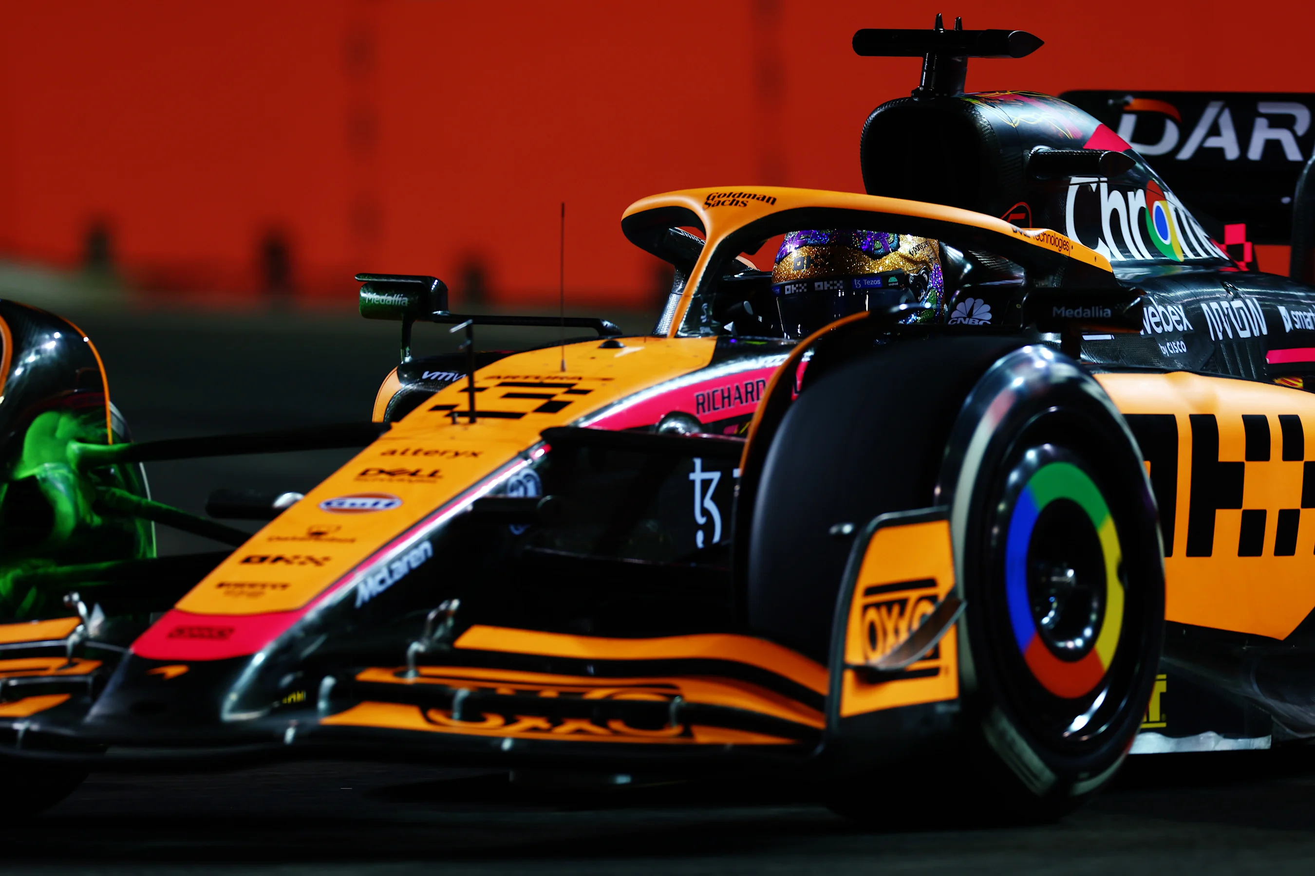 SINGAPORE, SINGAPORE - SEPTEMBER 30: Daniel Ricciardo of Australia driving the (3) McLaren MCL36