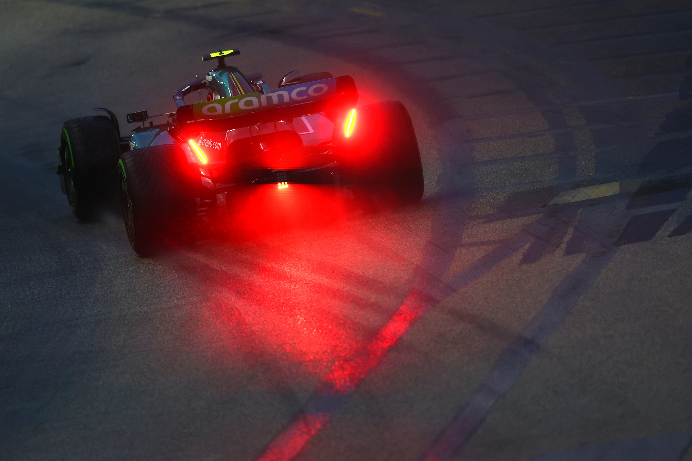 SINGAPORE, SINGAPORE - OCTOBER 01: Sebastian Vettel of Germany driving the (5) Aston Martin AMR22