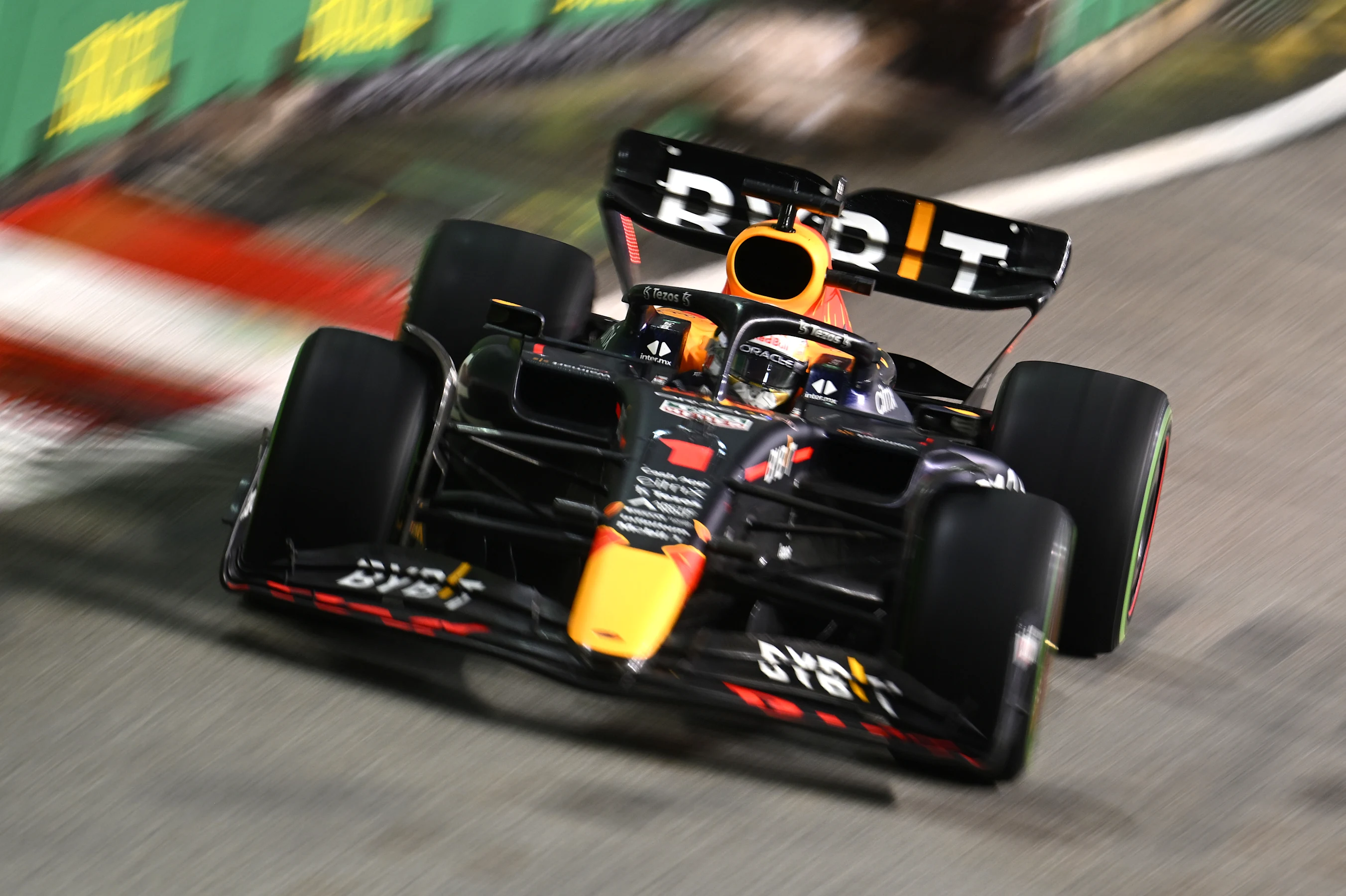 SINGAPORE, SINGAPORE - OCTOBER 02: Max Verstappen of the Netherlands driving the (1) Oracle Red