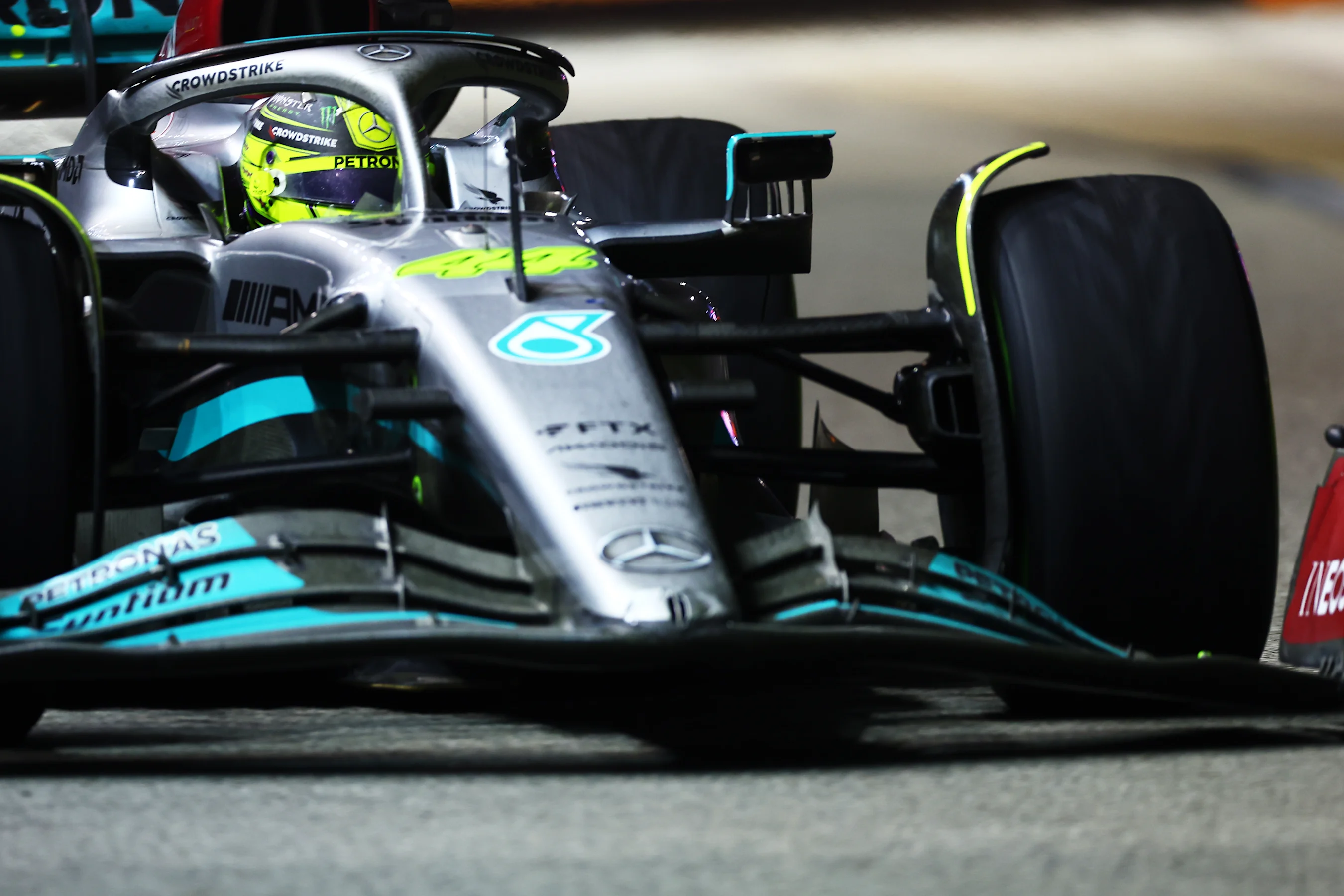 SINGAPORE, SINGAPORE - OCTOBER 02: Lewis Hamilton of Great Britain driving the (44) Mercedes AMG